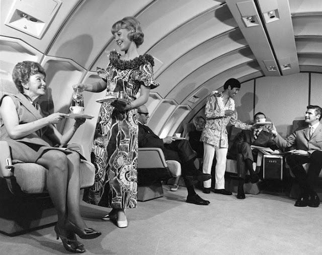 No baggage fees, just smiles and drinks. Welcome to the golden age of flying!, The sky and cocktail lounge era., Not just a plane, it was a flying party lounge., This Japan Airlines cabin looked like a flying art gallery., Seems like flying was basically a deli dream., Groove was in the skies., Cocktail hour in the clouds was a must., Airline lounges? More like a Bond movie set., When the in-flight meal came with real plates., Sipping and playing cards. Pure bliss., Back when everyone had lounge access., No baggage fees, just smiles and drinks., Conversation pods for a cruising altitude., Studio 54 with some light turbulence., First class or a retro nightclub?, Beef Wellington at 30,000 feet., No turbulence, just a toast in the aisle., Fresh fruit? Yes, please.