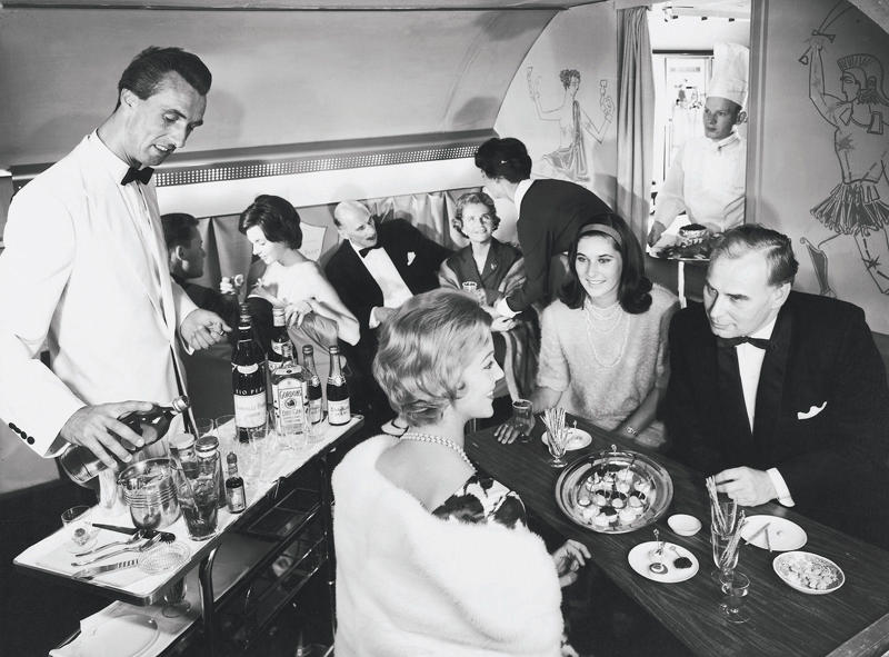 Cocktail hour in the clouds was a must. Welcome to the golden age of flying!, The sky and cocktail lounge era., Not just a plane, it was a flying party lounge., This Japan Airlines cabin looked like a flying art gallery., Seems like flying was basically a deli dream., Groove was in the skies., Cocktail hour in the clouds was a must., Airline lounges? More like a Bond movie set., When the in-flight meal came with real plates., Sipping and playing cards. Pure bliss., Back when everyone had lounge access., No baggage fees, just smiles and drinks., Conversation pods for a cruising altitude., Studio 54 with some light turbulence., First class or a retro nightclub?, Beef Wellington at 30,000 feet., No turbulence, just a toast in the aisle., Fresh fruit? Yes, please.