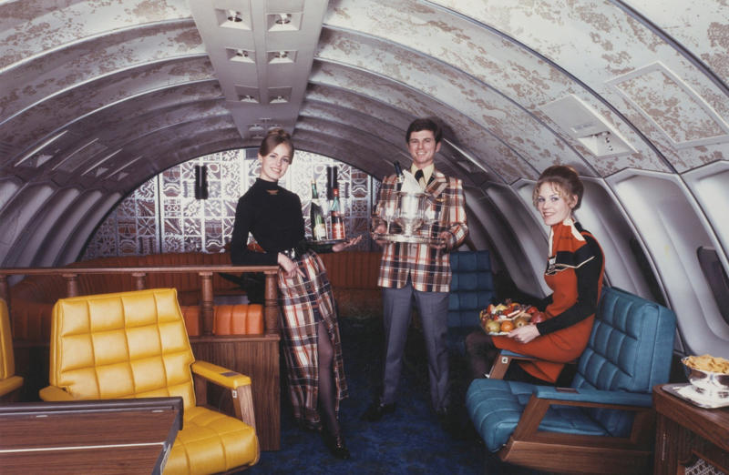 Not just a plane, it was a flying party lounge. Welcome to the golden age of flying!, The sky and cocktail lounge era., Not just a plane, it was a flying party lounge., This Japan Airlines cabin looked like a flying art gallery., Seems like flying was basically a deli dream., Groove was in the skies., Cocktail hour in the clouds was a must., Airline lounges? More like a Bond movie set., When the in-flight meal came with real plates., Sipping and playing cards. Pure bliss., Back when everyone had lounge access., No baggage fees, just smiles and drinks., Conversation pods for a cruising altitude., Studio 54 with some light turbulence., First class or a retro nightclub?, Beef Wellington at 30,000 feet., No turbulence, just a toast in the aisle., Fresh fruit? Yes, please.