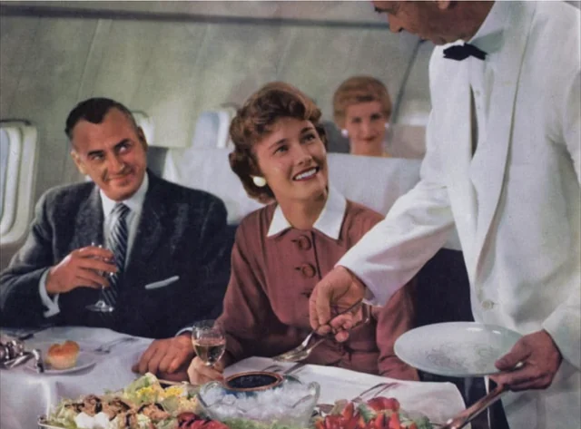 When the in-flight meal came with real plates. Welcome to the golden age of flying!, The sky and cocktail lounge era., Not just a plane, it was a flying party lounge., This Japan Airlines cabin looked like a flying art gallery., Seems like flying was basically a deli dream., Groove was in the skies., Cocktail hour in the clouds was a must., Airline lounges? More like a Bond movie set., When the in-flight meal came with real plates., Sipping and playing cards. Pure bliss., Back when everyone had lounge access., No baggage fees, just smiles and drinks., Conversation pods for a cruising altitude., Studio 54 with some light turbulence., First class or a retro nightclub?, Beef Wellington at 30,000 feet., No turbulence, just a toast in the aisle., Fresh fruit? Yes, please.