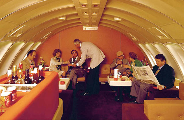 Back when everyone had lounge access. Welcome to the golden age of flying!, The sky and cocktail lounge era., Not just a plane, it was a flying party lounge., This Japan Airlines cabin looked like a flying art gallery., Seems like flying was basically a deli dream., Groove was in the skies., Cocktail hour in the clouds was a must., Airline lounges? More like a Bond movie set., When the in-flight meal came with real plates., Sipping and playing cards. Pure bliss., Back when everyone had lounge access., No baggage fees, just smiles and drinks., Conversation pods for a cruising altitude., Studio 54 with some light turbulence., First class or a retro nightclub?, Beef Wellington at 30,000 feet., No turbulence, just a toast in the aisle., Fresh fruit? Yes, please.