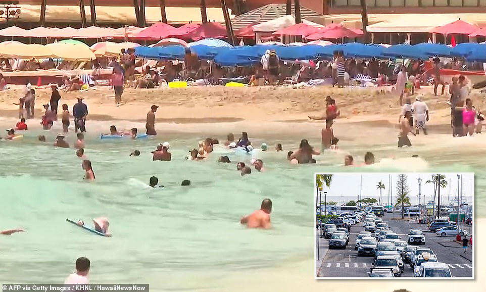 Swimmers ignore tsunami warning on Hawaii's Waikiki Beach