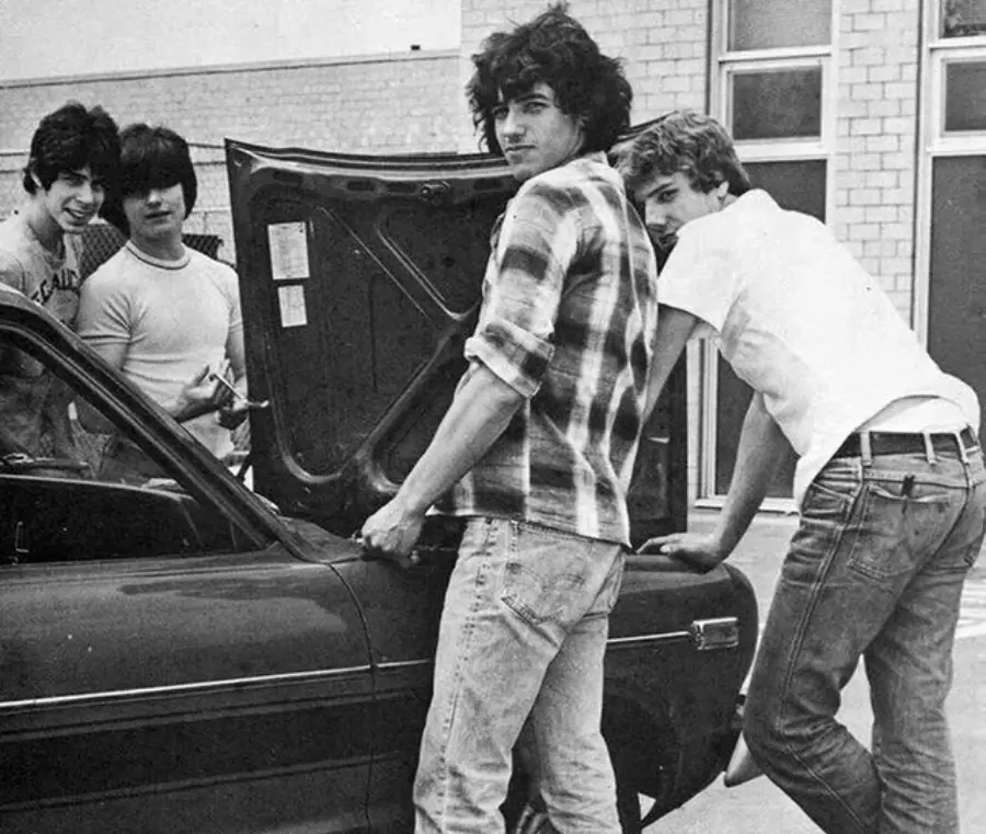 31. Four New Jersey Teens Check Under the Hood of a Car With a Backwards Design, 1979 1. Waiting In Line to See Star Wars, 1977, 2. January 19th 1977, The One and Only Day it Snowed in Miami, 3. Disco Sally, a 78-Year-Old Studio 54 Regular, Becomes a Symbol of the Era in 1978, 4. A Businessman Lights a Cigarette Inside a New York City Phone Booth in 1980, 5. Two Women Sit Casually on a Fire Escape in Harlem, NYC, in 1978, 6. Harrison Ford Appears as Colonel G. Lucas in Apocalypse Now, 1979, 7. In 1978, a Toddler Poses Next to the Family's New Color TV Like It's a Family Member, 8. Salesmen Sit on the Hoods of New Cars Waiting for Buyers at a California Dealership in 1979, 9. Kids Jump From a Fire Escape Onto Mattresses in NYC's Lower East Side, 1979, 10. Comic-Con San Diego in 1980 Captures the Wild Beginnings of Pop Culture Fandom, 11. The World's Largest Disco Draws Crowds to Buffalo in 1978, 12. Young Roller Skater in Red Moves Through Midtown Manhattan, 1979, 13. In 1978, Disco Dancing Lessons Spread to Suburbs Like Beaverton, Oregon, 14. An Apple II Computer and a Young Steve Jobs Revolutionize Tech in 1977, 15. A Woman Leans in to Kiss a Windsor Guard in a Whimsical Moment, 1980, 16. Two Guys Play Atari in Their Living Room in 1978, Defining Home Entertainment, 17. National Space Invaders Championship in 1980 Showcases a New Era of Gamers, 18. A Local News Crew in Texas Interviews Parents After Taking Kids to See Alien, 1979, 19. Young Woman in a "Consenting Adult" Shirt Enjoys the Rolling Stones in 1978, 20. In 1979, Reflections on the Dance Floor Captured the Disco Craze From Above, 21. A Canadian Gas Station Refuses to Fuel Soviet Ladas to Protest the Invasion of Afghanistan, 1980, 22. Subway Riders Carry Lawn Chairs for a Beach Day in NYC, Summer 1978, 23. High School Seniors Pose Before Heading on a Ski Trip in 1980, 24. Young Girl Embraces Teddy Boy Fashion and Rock 'n' Roll Dancing, 1979, 25. In 1980, Bronx Teens Turn the Streets Into a Stage With BMX Tricks, 26. Olivia Newton-John and John Travolta Redefine Teen Style on the Set of Grease, 1978, 27. KISS Fans in Buffalo, NY, Fully Embrace Glam Rock Culture, 1978, 28. New UK Prime Minister Margaret Thatcher Celebrates Her Election Victory, 1979, 29. The Sony Walkman Hits the Market With a Bold Ad Declaring "There's a Revolution in the Streets", 1980, 30. A Young Man Spins the Top Hits of 1978 on AM Radio Studio, 31. Four New Jersey Teens Check Under the Hood of a Car With a Backwards Design, 1979, 32. Elvis Presley's Final Performance in 1977 Leaves Fans With an Iconic Farewell, 33. Protesters Flood the Capitol in March 1980 to Oppose Military Draft Registration, 34. Staten Island Families Resort to Kerosene Lamps During the 1977 Blackout