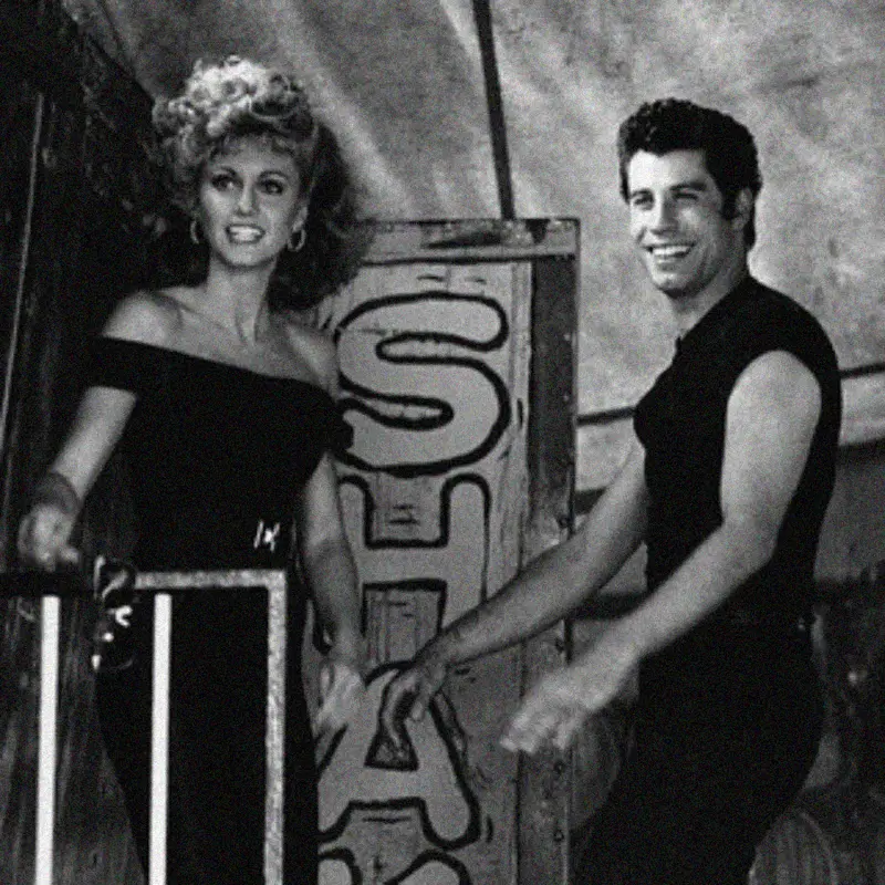 26. Olivia Newton-John and John Travolta Redefine Teen Style on the Set of Grease, 1978 1. Waiting In Line to See Star Wars, 1977, 2. January 19th 1977, The One and Only Day it Snowed in Miami, 3. Disco Sally, a 78-Year-Old Studio 54 Regular, Becomes a Symbol of the Era in 1978, 4. A Businessman Lights a Cigarette Inside a New York City Phone Booth in 1980, 5. Two Women Sit Casually on a Fire Escape in Harlem, NYC, in 1978, 6. Harrison Ford Appears as Colonel G. Lucas in Apocalypse Now, 1979, 7. In 1978, a Toddler Poses Next to the Family's New Color TV Like It's a Family Member, 8. Salesmen Sit on the Hoods of New Cars Waiting for Buyers at a California Dealership in 1979, 9. Kids Jump From a Fire Escape Onto Mattresses in NYC's Lower East Side, 1979, 10. Comic-Con San Diego in 1980 Captures the Wild Beginnings of Pop Culture Fandom, 11. The World's Largest Disco Draws Crowds to Buffalo in 1978, 12. Young Roller Skater in Red Moves Through Midtown Manhattan, 1979, 13. In 1978, Disco Dancing Lessons Spread to Suburbs Like Beaverton, Oregon, 14. An Apple II Computer and a Young Steve Jobs Revolutionize Tech in 1977, 15. A Woman Leans in to Kiss a Windsor Guard in a Whimsical Moment, 1980, 16. Two Guys Play Atari in Their Living Room in 1978, Defining Home Entertainment, 17. National Space Invaders Championship in 1980 Showcases a New Era of Gamers, 18. A Local News Crew in Texas Interviews Parents After Taking Kids to See Alien, 1979, 19. Young Woman in a "Consenting Adult" Shirt Enjoys the Rolling Stones in 1978, 20. In 1979, Reflections on the Dance Floor Captured the Disco Craze From Above, 21. A Canadian Gas Station Refuses to Fuel Soviet Ladas to Protest the Invasion of Afghanistan, 1980, 22. Subway Riders Carry Lawn Chairs for a Beach Day in NYC, Summer 1978, 23. High School Seniors Pose Before Heading on a Ski Trip in 1980, 24. Young Girl Embraces Teddy Boy Fashion and Rock 'n' Roll Dancing, 1979, 25. In 1980, Bronx Teens Turn the Streets Into a Stage With BMX Tricks, 26. Olivia Newton-John and John Travolta Redefine Teen Style on the Set of Grease, 1978, 27. KISS Fans in Buffalo, NY, Fully Embrace Glam Rock Culture, 1978, 28. New UK Prime Minister Margaret Thatcher Celebrates Her Election Victory, 1979, 29. The Sony Walkman Hits the Market With a Bold Ad Declaring "There's a Revolution in the Streets", 1980, 30. A Young Man Spins the Top Hits of 1978 on AM Radio Studio, 31. Four New Jersey Teens Check Under the Hood of a Car With a Backwards Design, 1979, 32. Elvis Presley's Final Performance in 1977 Leaves Fans With an Iconic Farewell, 33. Protesters Flood the Capitol in March 1980 to Oppose Military Draft Registration, 34. Staten Island Families Resort to Kerosene Lamps During the 1977 Blackout