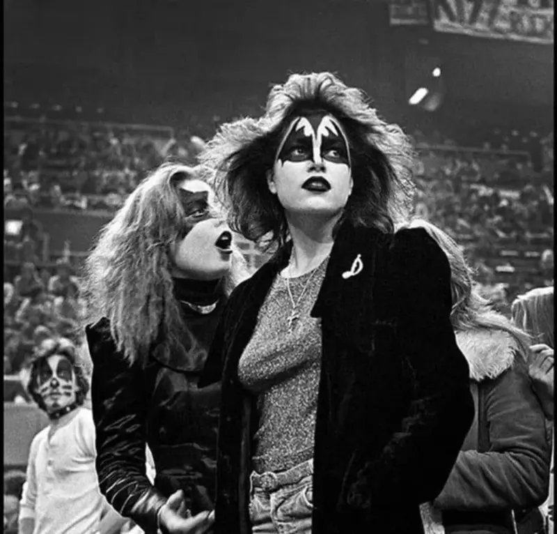 27. KISS Fans in Buffalo, NY, Fully Embrace Glam Rock Culture, 1978 1. Waiting In Line to See Star Wars, 1977, 2. January 19th 1977, The One and Only Day it Snowed in Miami, 3. Disco Sally, a 78-Year-Old Studio 54 Regular, Becomes a Symbol of the Era in 1978, 4. A Businessman Lights a Cigarette Inside a New York City Phone Booth in 1980, 5. Two Women Sit Casually on a Fire Escape in Harlem, NYC, in 1978, 6. Harrison Ford Appears as Colonel G. Lucas in Apocalypse Now, 1979, 7. In 1978, a Toddler Poses Next to the Family's New Color TV Like It's a Family Member, 8. Salesmen Sit on the Hoods of New Cars Waiting for Buyers at a California Dealership in 1979, 9. Kids Jump From a Fire Escape Onto Mattresses in NYC's Lower East Side, 1979, 10. Comic-Con San Diego in 1980 Captures the Wild Beginnings of Pop Culture Fandom, 11. The World's Largest Disco Draws Crowds to Buffalo in 1978, 12. Young Roller Skater in Red Moves Through Midtown Manhattan, 1979, 13. In 1978, Disco Dancing Lessons Spread to Suburbs Like Beaverton, Oregon, 14. An Apple II Computer and a Young Steve Jobs Revolutionize Tech in 1977, 15. A Woman Leans in to Kiss a Windsor Guard in a Whimsical Moment, 1980, 16. Two Guys Play Atari in Their Living Room in 1978, Defining Home Entertainment, 17. National Space Invaders Championship in 1980 Showcases a New Era of Gamers, 18. A Local News Crew in Texas Interviews Parents After Taking Kids to See Alien, 1979, 19. Young Woman in a "Consenting Adult" Shirt Enjoys the Rolling Stones in 1978, 20. In 1979, Reflections on the Dance Floor Captured the Disco Craze From Above, 21. A Canadian Gas Station Refuses to Fuel Soviet Ladas to Protest the Invasion of Afghanistan, 1980, 22. Subway Riders Carry Lawn Chairs for a Beach Day in NYC, Summer 1978, 23. High School Seniors Pose Before Heading on a Ski Trip in 1980, 24. Young Girl Embraces Teddy Boy Fashion and Rock 'n' Roll Dancing, 1979, 25. In 1980, Bronx Teens Turn the Streets Into a Stage With BMX Tricks, 26. Olivia Newton-John and John Travolta Redefine Teen Style on the Set of Grease, 1978, 27. KISS Fans in Buffalo, NY, Fully Embrace Glam Rock Culture, 1978, 28. New UK Prime Minister Margaret Thatcher Celebrates Her Election Victory, 1979, 29. The Sony Walkman Hits the Market With a Bold Ad Declaring "There's a Revolution in the Streets", 1980, 30. A Young Man Spins the Top Hits of 1978 on AM Radio Studio, 31. Four New Jersey Teens Check Under the Hood of a Car With a Backwards Design, 1979, 32. Elvis Presley's Final Performance in 1977 Leaves Fans With an Iconic Farewell, 33. Protesters Flood the Capitol in March 1980 to Oppose Military Draft Registration, 34. Staten Island Families Resort to Kerosene Lamps During the 1977 Blackout