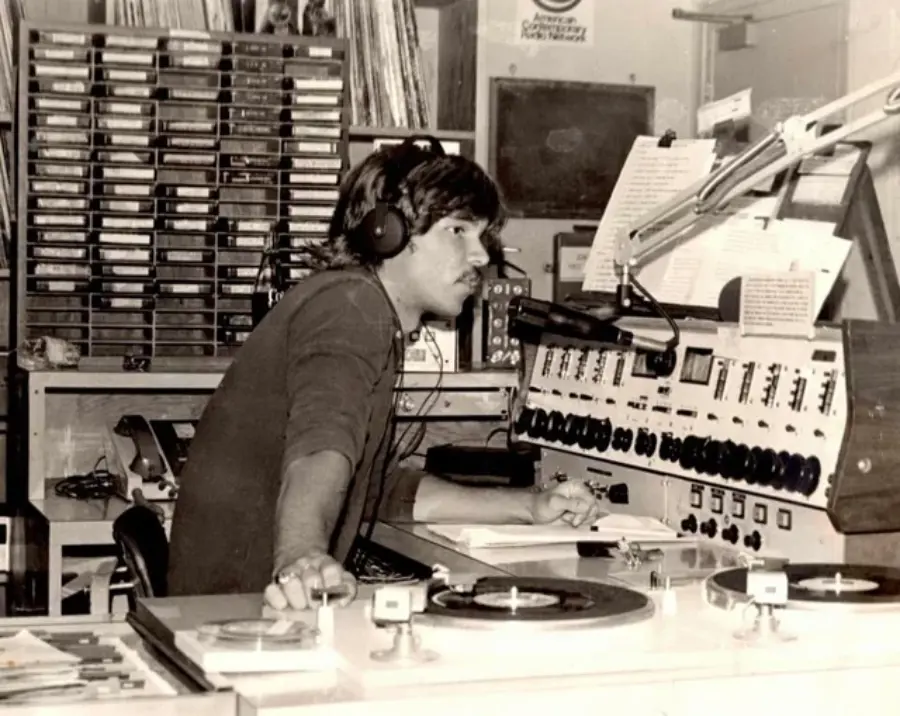 30. A Young Man Spins the Top Hits of 1978 on AM Radio Studio 1. Waiting In Line to See Star Wars, 1977, 2. January 19th 1977, The One and Only Day it Snowed in Miami, 3. Disco Sally, a 78-Year-Old Studio 54 Regular, Becomes a Symbol of the Era in 1978, 4. A Businessman Lights a Cigarette Inside a New York City Phone Booth in 1980, 5. Two Women Sit Casually on a Fire Escape in Harlem, NYC, in 1978, 6. Harrison Ford Appears as Colonel G. Lucas in Apocalypse Now, 1979, 7. In 1978, a Toddler Poses Next to the Family's New Color TV Like It's a Family Member, 8. Salesmen Sit on the Hoods of New Cars Waiting for Buyers at a California Dealership in 1979, 9. Kids Jump From a Fire Escape Onto Mattresses in NYC's Lower East Side, 1979, 10. Comic-Con San Diego in 1980 Captures the Wild Beginnings of Pop Culture Fandom, 11. The World's Largest Disco Draws Crowds to Buffalo in 1978, 12. Young Roller Skater in Red Moves Through Midtown Manhattan, 1979, 13. In 1978, Disco Dancing Lessons Spread to Suburbs Like Beaverton, Oregon, 14. An Apple II Computer and a Young Steve Jobs Revolutionize Tech in 1977, 15. A Woman Leans in to Kiss a Windsor Guard in a Whimsical Moment, 1980, 16. Two Guys Play Atari in Their Living Room in 1978, Defining Home Entertainment, 17. National Space Invaders Championship in 1980 Showcases a New Era of Gamers, 18. A Local News Crew in Texas Interviews Parents After Taking Kids to See Alien, 1979, 19. Young Woman in a "Consenting Adult" Shirt Enjoys the Rolling Stones in 1978, 20. In 1979, Reflections on the Dance Floor Captured the Disco Craze From Above, 21. A Canadian Gas Station Refuses to Fuel Soviet Ladas to Protest the Invasion of Afghanistan, 1980, 22. Subway Riders Carry Lawn Chairs for a Beach Day in NYC, Summer 1978, 23. High School Seniors Pose Before Heading on a Ski Trip in 1980, 24. Young Girl Embraces Teddy Boy Fashion and Rock 'n' Roll Dancing, 1979, 25. In 1980, Bronx Teens Turn the Streets Into a Stage With BMX Tricks, 26. Olivia Newton-John and John Travolta Redefine Teen Style on the Set of Grease, 1978, 27. KISS Fans in Buffalo, NY, Fully Embrace Glam Rock Culture, 1978, 28. New UK Prime Minister Margaret Thatcher Celebrates Her Election Victory, 1979, 29. The Sony Walkman Hits the Market With a Bold Ad Declaring "There's a Revolution in the Streets", 1980, 30. A Young Man Spins the Top Hits of 1978 on AM Radio Studio, 31. Four New Jersey Teens Check Under the Hood of a Car With a Backwards Design, 1979, 32. Elvis Presley's Final Performance in 1977 Leaves Fans With an Iconic Farewell, 33. Protesters Flood the Capitol in March 1980 to Oppose Military Draft Registration, 34. Staten Island Families Resort to Kerosene Lamps During the 1977 Blackout