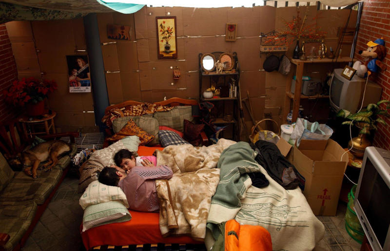 Madrid, Spain: widespread evictions How people live in the world's busiest cities, Melbourne, Australia: home to 5.3 million people, Melbourne, Australia: empty houses, Singapore: home to 6.1 million people, Singapore: subsidised living, Toronto, Canada: home to 6.5 million people, Madrid, Spain: home to 6.8 million people, Madrid, Spain: widespread evictions, Hong Kong: home to 7.7 million people, Hong Kong: cage homes, New York City, United States: home to 7.9 million people, London, United Kingdom: home to 9.8 million people, London, United Kingdom: sheltered family housing, Paris, France: home to 11.3 million people, Paris, France: unusually small spaces, Mexico City, Mexico: home to 22.8 million people, Mexico City, Mexico: precarious living, São Paulo, Brazil: home to 22.9 million people, São Paulo, Brazil: inadequate accommodation, Shanghai, China: home to 30.5 million people, Shanghai, China: bed leasing, Delhi, India: home to 34.6 million people, Delhi, India: cramped family homes, Tokyo, Japan: home to 37 million people