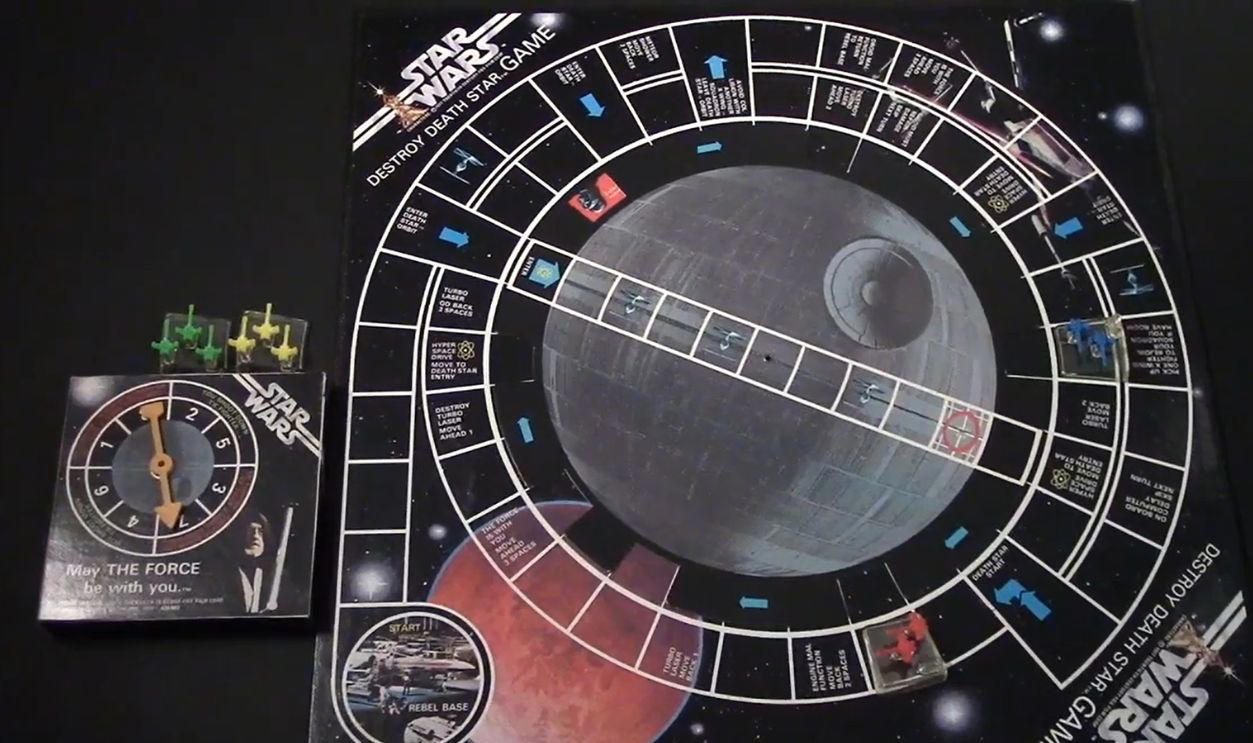 Star Wars: Destroy Death Star Game (1977 Kenner) 3D Monopoly (1991 Franklin Mint), The Beatles Flip Your Wig (1964 Milton Bradley), Dark Tower (1981 Milton Bradley), Key to the Kingdom (1990 Golden), Voice of the Mummy (1971 Milton Bradley), McDonald’s Game (1975 Milton Bradley), Be A Manager Baseball (1967 Cadaco), The Game of Goose (Early 1900s editions), Star Wars: Destroy Death Star Game (1977 Kenner), Disney’s Haunted Mansion Game (1972 Lakeside), Fortune (1935 Parker Brothers), Camp Granada (1965 Milton Bradley), Haunted House (1962 Milton Bradley), The Omega Virus (1992 Milton Bradley), Torpedo Run! (1986 Milton Bradley), The Magnificent Race (1963 Transogram), Chivalry (1960 Transogram), The Grape Escape (1992 Parker Brothers)