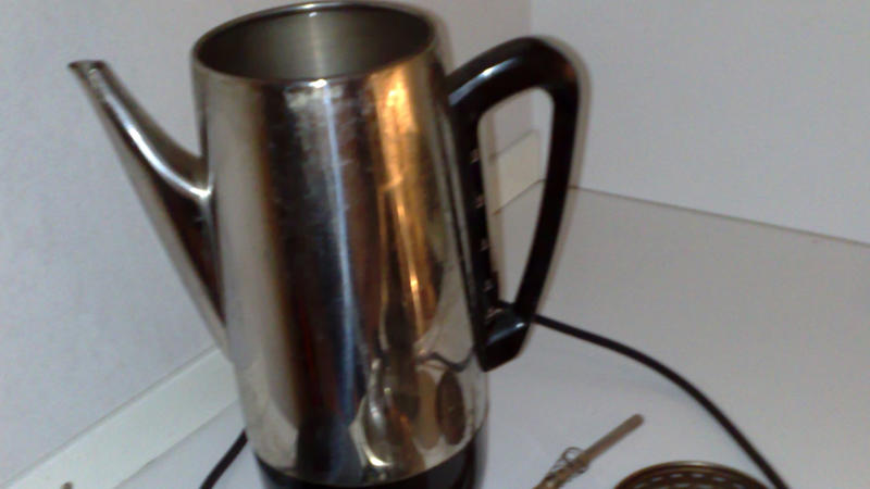 Universal Coffeematic Percolator (1950s) Thrift Store Gold Mines, KitchenAid Model 'K' Mixer (1930s–50s), Sunbeam Mixmaster (1930s–60s), Toast-O-Lator Toaster (1940s), General Electric Monitor Top Refrigerator (1927–1930s), Westinghouse L-5 Waffle Iron (1930s), Vitamix Blender (1940s–60s), Dormeyer Mixwell Mixers (1950s), Hamilton Beach Milkshake Mixer (1950s), Coldspot Refrigerator by Sears (1940s–50s), Universal Coffeematic Percolator (1950s), Oster Regency Kitchen Center (1970s–80s), Crosley Shelvador Refrigerator (1940s), Vintage Soda Syphons (1930s–60s), Wear-Ever Juicers (1950s), GE Wall-Mount Can Openers (1960s), Kenmore Rotisserie Ovens (1950s–60s), Electric Egg Cookers (Sunbeam, GE – 1950s–70s), Bakelite Hand Mixers (1930s–40s), Hoosier Cabinets (1920s–30s), Early Crock-Pots (Rival – 1970s), Arvin Hot Plates (1940s–50s)