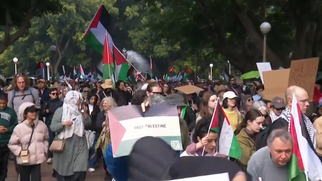 Thousands more expected to join march, Famous faces join protest, Police close Sydney Harbour Bridge, Protesters arrive at meeting point in Sydney, Commuters warned to avoid the city, Weather won't deter protesters in Sydney, Thousands to descend on Melbourne CBD