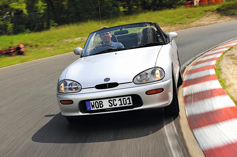 24. Suzuki Cappuccino 1. Datsun 240Z, 2. Honda Accord, 3. Honda Civic Type R, 4. Honda NSX, 5. Honda Prelude, 6. Honda S500, 7. Isuzu Trooper, 8. Lexus LS 400, 9. Mazda Cosmo, 10. Mazda MX-5, 11. Mazda RX-7, 12. Mitsubishi 3000GT, 13. Mitsubishi Evo, 14. Mitsubishi Lancer, 15. Mitsubishi Model A, 16. Mitsubishi Shogun, 17. Nissan 300ZX, 18. Nissan Micra, 19. Nissan Skyline GT-R, 20. Nissan Sunny, 21. Subaru Brat, 22. Subaru Impreza, 23. Subaru Legacy, 24. Suzuki Cappuccino, 25. Suzuki Jimny, 26. Suzuki Swift, 27. Toyota 2000GT, 28. Toyota Celica, 29. Toyota Corolla, 30. Toyota HiAce, 31. Toyota Land Cruiser, 32. Toyota MR2, 33. Toyota Supra, 34. Toyota Yaris