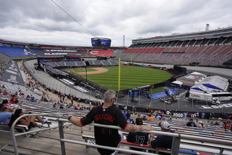 Pregame pageantry, Great spectacle, not a great view, Hall of Famers in the rain, Fewer fans returned after postponement, Bristol Motor Speedway swallows the baseball field, The Colossus looms, The Home Run Car goes racing, Checkered flag waves for Eli White