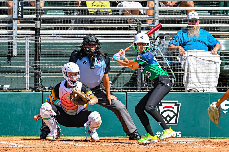 Washington's Anna Yoo (No. 13) waits on a pitch from Florida's pitcher at the 2025 Little League Softball World Series in Greenville, North Carolina