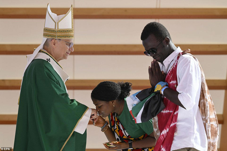 Pope Francis makes helicopter entrance for open-air prayer vigil