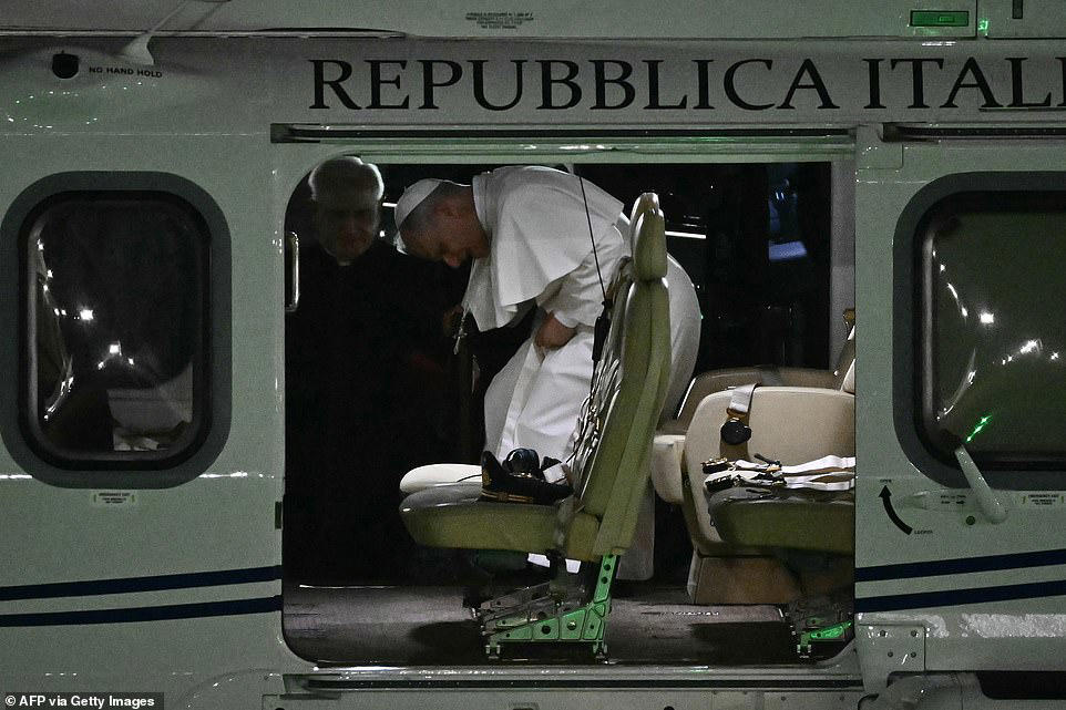 Pope Francis makes helicopter entrance for open-air prayer vigil