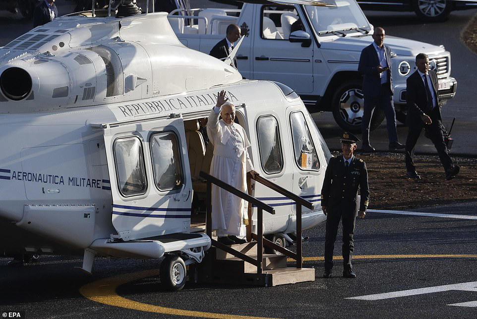 Pope Francis makes helicopter entrance for open-air prayer vigil