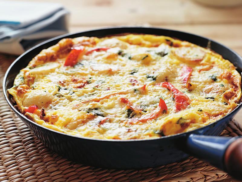 Can you reheat frittata?, Frittata recipes for breakfast, lunch and dinner, Mega vegie and haloumi frittata , Basil frittata with smoked salmon , Rainbow chard and three-cheese frittata , Roast pumpkin and zucchini frittata , Roasted pumpkin, spinach and fetta slice , Primavera frittata , Asparagus, tomato, ricotta and basil frittata , Potato, capsicum and spinach frittata , Quick three-cheese frittata , Kale and quinoa frittata , Pea and broad bean frittata , Rocket and prosciutto frittata , Ham and egg frittata , Chorizo & potato frittata , Asparagus frittata , Silverbeet frittata , Smoked trout frittata , Chilli and vegetable frittata , Broccoli and cheese frittata , Baked potato, ham and cheese frittata , Spanish frittata , Wild mushroom and green onion frittata , Potato, capsicum and olive frittata , Three-cheese pasta frittata , Zucchini and corn frittatas , Capsicum and potato frittata , Green power mini frittatas with spinach and feta , Bacon, pea and corn frittata , Asparagus & fetta frittata , Zucchini flower and tomato frittata , Tomato, feta and pancetta frittata , Why we love these frittatas, More quick & easy recipes