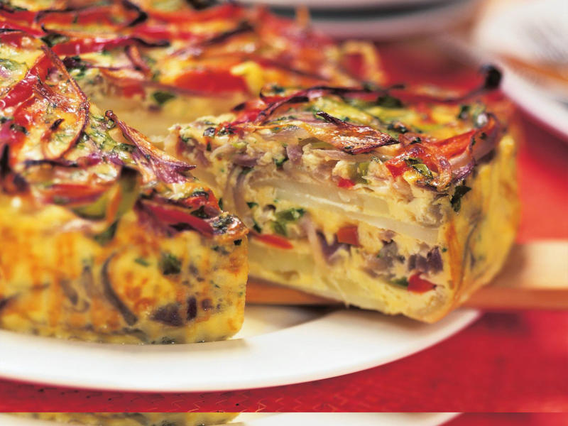 Can you reheat frittata?, Frittata recipes for breakfast, lunch and dinner, Mega vegie and haloumi frittata , Basil frittata with smoked salmon , Rainbow chard and three-cheese frittata , Roast pumpkin and zucchini frittata , Roasted pumpkin, spinach and fetta slice , Primavera frittata , Asparagus, tomato, ricotta and basil frittata , Potato, capsicum and spinach frittata , Quick three-cheese frittata , Kale and quinoa frittata , Pea and broad bean frittata , Rocket and prosciutto frittata , Ham and egg frittata , Chorizo & potato frittata , Asparagus frittata , Silverbeet frittata , Smoked trout frittata , Chilli and vegetable frittata , Broccoli and cheese frittata , Baked potato, ham and cheese frittata , Spanish frittata , Wild mushroom and green onion frittata , Potato, capsicum and olive frittata , Three-cheese pasta frittata , Zucchini and corn frittatas , Capsicum and potato frittata , Green power mini frittatas with spinach and feta , Bacon, pea and corn frittata , Asparagus & fetta frittata , Zucchini flower and tomato frittata , Tomato, feta and pancetta frittata , Why we love these frittatas, More quick & easy recipes