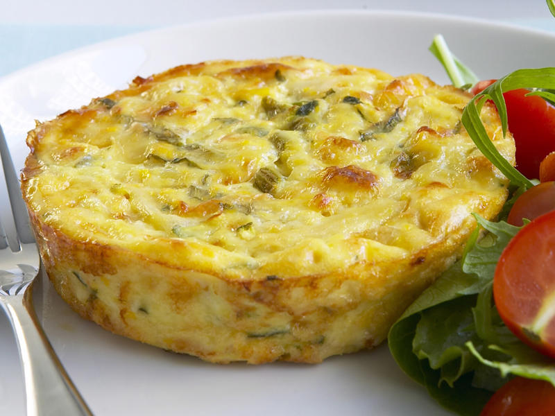 Can you reheat frittata?, Frittata recipes for breakfast, lunch and dinner, Mega vegie and haloumi frittata , Basil frittata with smoked salmon , Rainbow chard and three-cheese frittata , Roast pumpkin and zucchini frittata , Roasted pumpkin, spinach and fetta slice , Primavera frittata , Asparagus, tomato, ricotta and basil frittata , Potato, capsicum and spinach frittata , Quick three-cheese frittata , Kale and quinoa frittata , Pea and broad bean frittata , Rocket and prosciutto frittata , Ham and egg frittata , Chorizo & potato frittata , Asparagus frittata , Silverbeet frittata , Smoked trout frittata , Chilli and vegetable frittata , Broccoli and cheese frittata , Baked potato, ham and cheese frittata , Spanish frittata , Wild mushroom and green onion frittata , Potato, capsicum and olive frittata , Three-cheese pasta frittata , Zucchini and corn frittatas , Capsicum and potato frittata , Green power mini frittatas with spinach and feta , Bacon, pea and corn frittata , Asparagus & fetta frittata , Zucchini flower and tomato frittata , Tomato, feta and pancetta frittata , Why we love these frittatas, More quick & easy recipes