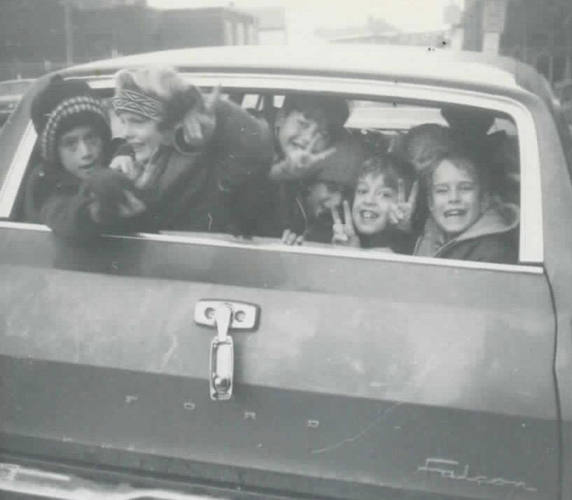 14. Because Who Needs Seatbelts? 1. Smile! Picture Day for a 2nd Grade Class, 2. ‘Christmas Day at Our Grandparent’s House in Jamaica, Queens’, 3. A Vietnam War Veteran Throws His Medal at the Capitol in Protest, Washington, D.C., April 23, 1971, 4. ‘My Mom in 1971’, 5. Wood Paneling and Shag Carpeting: Peak ’70s Vibes, 6. Colorized Image of Muhammad Ali Dodging a Punch From Joe Frazier in What Became Known as the ‘Fight of the Century’, 7. ‘Christmas, 1971. The Entire Family at My Grandparent’s House’, 8. Anti-Vietnam Protesters March Against War and Better Working Conditions in New York City, 9. Gene Wilder Shares a Laugh With Then-Child Actor Peter Ostrum, 10. ‘My Dad (Front) in Vietnam, 1971’, 11. Talk About a Boss Baby: ‘My Grandma and Uncle in Iran, April 1971’, 12. A Busy Street Scene in Midtown, Manhattan, 13. ‘Saturday Morning TV Lineup, Fall 1971’, 14. Because Who Needs Seatbelts?, 15. A Kid Shows Off His Brand New Christmas Gift, 16. ‘My Dad and Mom on Their Wedding Day, USSR, Ukraine’, 17. Richard Burton and Elizabeth Taylor at Heathrow Airport in London, 18. ‘My Dad and His Band, 1971’, 19. Just Some Siblings Being Silly on Easter Morning in New Jersey, 20. Actor Anthony Quinn on The Dick Cavett Show, 21. Christine ‘Chris’ Evert at the 1971 US Open, 22. ‘My Mom Being Crowned Homecoming Queen in 1971, Alabama’, 23. Actor Paul Newman Pictured at a Derby, September 1971, 24. ‘Bicycle Winner in a Shoe Store, 1971’, 25. Three Generations of Pearly White Smiles, 26. Crowds Gather Outside the Fillmore East in New York City, 27. ‘Cher at the Playboy Club, 1971’, 28. A Lively High School Parking Lot, 29. A Young Steve Martin Looking Effortlessly Cool, 30. ‘Ozzy Osbourne and His First Wife Thelma in 1971’, 31. Think There’s Enough Milk Stocked at the Grocery Store?, 32. Led Zeppelin Staying True to the Big Hair Trend of the ’70s, 33. John Lennon Poses Next to a Psychedelic Rolls-Royce With Son Julian, 34. A Very Colorful Shelley Duvall in Vogue