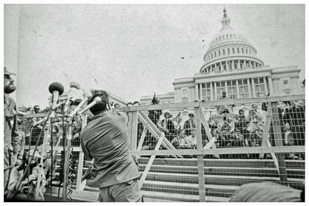 3. A Vietnam War Veteran Throws His Medal at the Capitol in Protest, Washington, D.C., April 23, 1971 1. Smile! Picture Day for a 2nd Grade Class, 2. ‘Christmas Day at Our Grandparent’s House in Jamaica, Queens’, 3. A Vietnam War Veteran Throws His Medal at the Capitol in Protest, Washington, D.C., April 23, 1971, 4. ‘My Mom in 1971’, 5. Wood Paneling and Shag Carpeting: Peak ’70s Vibes, 6. Colorized Image of Muhammad Ali Dodging a Punch From Joe Frazier in What Became Known as the ‘Fight of the Century’, 7. ‘Christmas, 1971. The Entire Family at My Grandparent’s House’, 8. Anti-Vietnam Protesters March Against War and Better Working Conditions in New York City, 9. Gene Wilder Shares a Laugh With Then-Child Actor Peter Ostrum, 10. ‘My Dad (Front) in Vietnam, 1971’, 11. Talk About a Boss Baby: ‘My Grandma and Uncle in Iran, April 1971’, 12. A Busy Street Scene in Midtown, Manhattan, 13. ‘Saturday Morning TV Lineup, Fall 1971’, 14. Because Who Needs Seatbelts?, 15. A Kid Shows Off His Brand New Christmas Gift, 16. ‘My Dad and Mom on Their Wedding Day, USSR, Ukraine’, 17. Richard Burton and Elizabeth Taylor at Heathrow Airport in London, 18. ‘My Dad and His Band, 1971’, 19. Just Some Siblings Being Silly on Easter Morning in New Jersey, 20. Actor Anthony Quinn on The Dick Cavett Show, 21. Christine ‘Chris’ Evert at the 1971 US Open, 22. ‘My Mom Being Crowned Homecoming Queen in 1971, Alabama’, 23. Actor Paul Newman Pictured at a Derby, September 1971, 24. ‘Bicycle Winner in a Shoe Store, 1971’, 25. Three Generations of Pearly White Smiles, 26. Crowds Gather Outside the Fillmore East in New York City, 27. ‘Cher at the Playboy Club, 1971’, 28. A Lively High School Parking Lot, 29. A Young Steve Martin Looking Effortlessly Cool, 30. ‘Ozzy Osbourne and His First Wife Thelma in 1971’, 31. Think There’s Enough Milk Stocked at the Grocery Store?, 32. Led Zeppelin Staying True to the Big Hair Trend of the ’70s, 33. John Lennon Poses Next to a Psychedelic Rolls-Royce With Son Julian, 34. A Very Colorful Shelley Duvall in Vogue