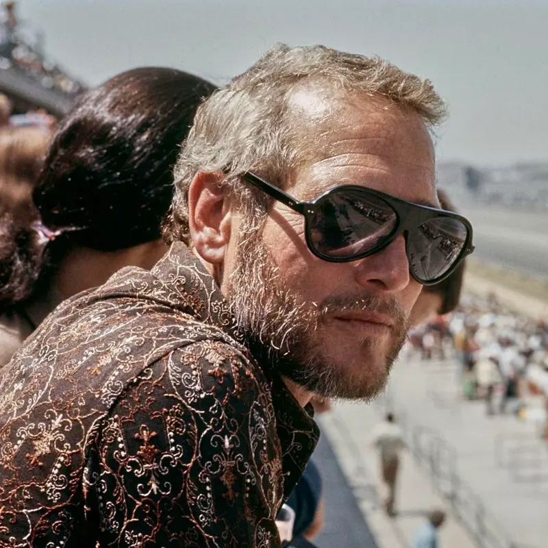 23. Actor Paul Newman Pictured at a Derby, September 1971 1. Smile! Picture Day for a 2nd Grade Class, 2. ‘Christmas Day at Our Grandparent’s House in Jamaica, Queens’, 3. A Vietnam War Veteran Throws His Medal at the Capitol in Protest, Washington, D.C., April 23, 1971, 4. ‘My Mom in 1971’, 5. Wood Paneling and Shag Carpeting: Peak ’70s Vibes, 6. Colorized Image of Muhammad Ali Dodging a Punch From Joe Frazier in What Became Known as the ‘Fight of the Century’, 7. ‘Christmas, 1971. The Entire Family at My Grandparent’s House’, 8. Anti-Vietnam Protesters March Against War and Better Working Conditions in New York City, 9. Gene Wilder Shares a Laugh With Then-Child Actor Peter Ostrum, 10. ‘My Dad (Front) in Vietnam, 1971’, 11. Talk About a Boss Baby: ‘My Grandma and Uncle in Iran, April 1971’, 12. A Busy Street Scene in Midtown, Manhattan, 13. ‘Saturday Morning TV Lineup, Fall 1971’, 14. Because Who Needs Seatbelts?, 15. A Kid Shows Off His Brand New Christmas Gift, 16. ‘My Dad and Mom on Their Wedding Day, USSR, Ukraine’, 17. Richard Burton and Elizabeth Taylor at Heathrow Airport in London, 18. ‘My Dad and His Band, 1971’, 19. Just Some Siblings Being Silly on Easter Morning in New Jersey, 20. Actor Anthony Quinn on The Dick Cavett Show, 21. Christine ‘Chris’ Evert at the 1971 US Open, 22. ‘My Mom Being Crowned Homecoming Queen in 1971, Alabama’, 23. Actor Paul Newman Pictured at a Derby, September 1971, 24. ‘Bicycle Winner in a Shoe Store, 1971’, 25. Three Generations of Pearly White Smiles, 26. Crowds Gather Outside the Fillmore East in New York City, 27. ‘Cher at the Playboy Club, 1971’, 28. A Lively High School Parking Lot, 29. A Young Steve Martin Looking Effortlessly Cool, 30. ‘Ozzy Osbourne and His First Wife Thelma in 1971’, 31. Think There’s Enough Milk Stocked at the Grocery Store?, 32. Led Zeppelin Staying True to the Big Hair Trend of the ’70s, 33. John Lennon Poses Next to a Psychedelic Rolls-Royce With Son Julian, 34. A Very Colorful Shelley Duvall in Vogue