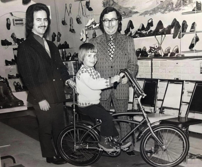 24. ‘Bicycle Winner in a Shoe Store, 1971’ 1. Smile! Picture Day for a 2nd Grade Class, 2. ‘Christmas Day at Our Grandparent’s House in Jamaica, Queens’, 3. A Vietnam War Veteran Throws His Medal at the Capitol in Protest, Washington, D.C., April 23, 1971, 4. ‘My Mom in 1971’, 5. Wood Paneling and Shag Carpeting: Peak ’70s Vibes, 6. Colorized Image of Muhammad Ali Dodging a Punch From Joe Frazier in What Became Known as the ‘Fight of the Century’, 7. ‘Christmas, 1971. The Entire Family at My Grandparent’s House’, 8. Anti-Vietnam Protesters March Against War and Better Working Conditions in New York City, 9. Gene Wilder Shares a Laugh With Then-Child Actor Peter Ostrum, 10. ‘My Dad (Front) in Vietnam, 1971’, 11. Talk About a Boss Baby: ‘My Grandma and Uncle in Iran, April 1971’, 12. A Busy Street Scene in Midtown, Manhattan, 13. ‘Saturday Morning TV Lineup, Fall 1971’, 14. Because Who Needs Seatbelts?, 15. A Kid Shows Off His Brand New Christmas Gift, 16. ‘My Dad and Mom on Their Wedding Day, USSR, Ukraine’, 17. Richard Burton and Elizabeth Taylor at Heathrow Airport in London, 18. ‘My Dad and His Band, 1971’, 19. Just Some Siblings Being Silly on Easter Morning in New Jersey, 20. Actor Anthony Quinn on The Dick Cavett Show, 21. Christine ‘Chris’ Evert at the 1971 US Open, 22. ‘My Mom Being Crowned Homecoming Queen in 1971, Alabama’, 23. Actor Paul Newman Pictured at a Derby, September 1971, 24. ‘Bicycle Winner in a Shoe Store, 1971’, 25. Three Generations of Pearly White Smiles, 26. Crowds Gather Outside the Fillmore East in New York City, 27. ‘Cher at the Playboy Club, 1971’, 28. A Lively High School Parking Lot, 29. A Young Steve Martin Looking Effortlessly Cool, 30. ‘Ozzy Osbourne and His First Wife Thelma in 1971’, 31. Think There’s Enough Milk Stocked at the Grocery Store?, 32. Led Zeppelin Staying True to the Big Hair Trend of the ’70s, 33. John Lennon Poses Next to a Psychedelic Rolls-Royce With Son Julian, 34. A Very Colorful Shelley Duvall in Vogue