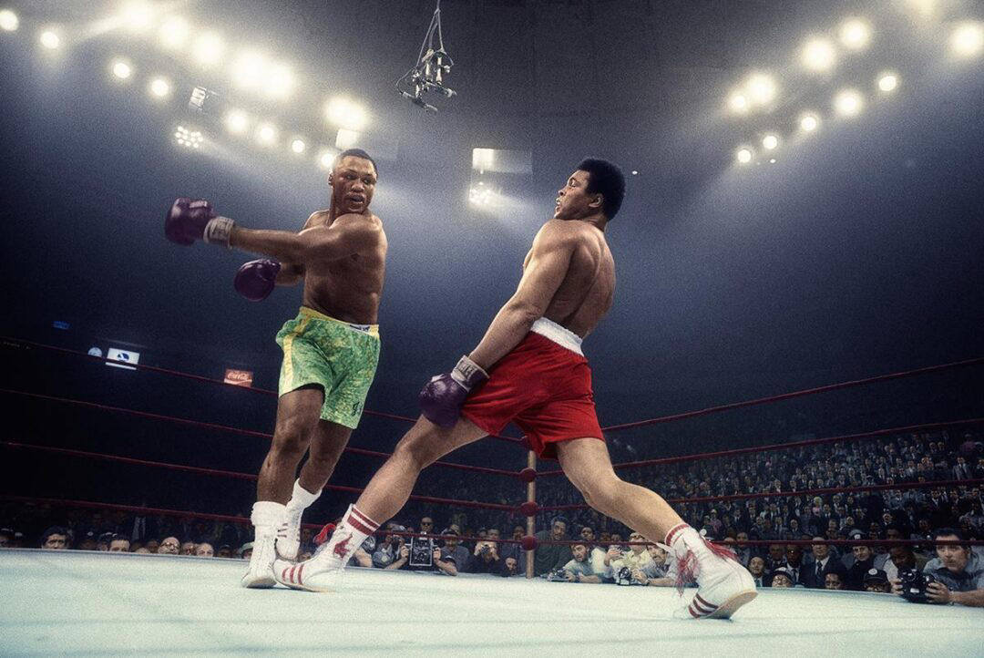 6. Colorized Image of Muhammad Ali Dodging a Punch From Joe Frazier in What Became Known as the ‘Fight of the Century’ 1. Smile! Picture Day for a 2nd Grade Class, 2. ‘Christmas Day at Our Grandparent’s House in Jamaica, Queens’, 3. A Vietnam War Veteran Throws His Medal at the Capitol in Protest, Washington, D.C., April 23, 1971, 4. ‘My Mom in 1971’, 5. Wood Paneling and Shag Carpeting: Peak ’70s Vibes, 6. Colorized Image of Muhammad Ali Dodging a Punch From Joe Frazier in What Became Known as the ‘Fight of the Century’, 7. ‘Christmas, 1971. The Entire Family at My Grandparent’s House’, 8. Anti-Vietnam Protesters March Against War and Better Working Conditions in New York City, 9. Gene Wilder Shares a Laugh With Then-Child Actor Peter Ostrum, 10. ‘My Dad (Front) in Vietnam, 1971’, 11. Talk About a Boss Baby: ‘My Grandma and Uncle in Iran, April 1971’, 12. A Busy Street Scene in Midtown, Manhattan, 13. ‘Saturday Morning TV Lineup, Fall 1971’, 14. Because Who Needs Seatbelts?, 15. A Kid Shows Off His Brand New Christmas Gift, 16. ‘My Dad and Mom on Their Wedding Day, USSR, Ukraine’, 17. Richard Burton and Elizabeth Taylor at Heathrow Airport in London, 18. ‘My Dad and His Band, 1971’, 19. Just Some Siblings Being Silly on Easter Morning in New Jersey, 20. Actor Anthony Quinn on The Dick Cavett Show, 21. Christine ‘Chris’ Evert at the 1971 US Open, 22. ‘My Mom Being Crowned Homecoming Queen in 1971, Alabama’, 23. Actor Paul Newman Pictured at a Derby, September 1971, 24. ‘Bicycle Winner in a Shoe Store, 1971’, 25. Three Generations of Pearly White Smiles, 26. Crowds Gather Outside the Fillmore East in New York City, 27. ‘Cher at the Playboy Club, 1971’, 28. A Lively High School Parking Lot, 29. A Young Steve Martin Looking Effortlessly Cool, 30. ‘Ozzy Osbourne and His First Wife Thelma in 1971’, 31. Think There’s Enough Milk Stocked at the Grocery Store?, 32. Led Zeppelin Staying True to the Big Hair Trend of the ’70s, 33. John Lennon Poses Next to a Psychedelic Rolls-Royce With Son Julian, 34. A Very Colorful Shelley Duvall in Vogue