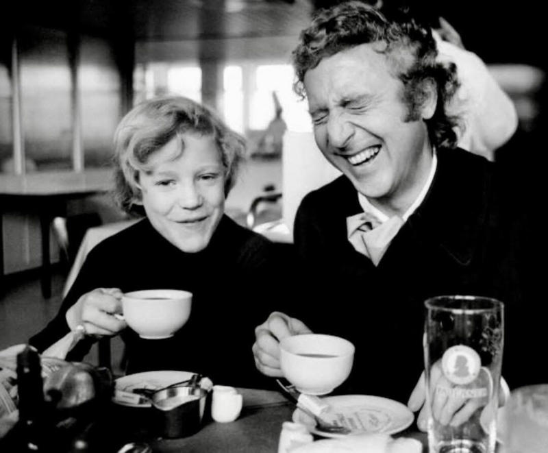 9. Gene Wilder Shares a Laugh With Then-Child Actor Peter Ostrum 1. Smile! Picture Day for a 2nd Grade Class, 2. ‘Christmas Day at Our Grandparent’s House in Jamaica, Queens’, 3. A Vietnam War Veteran Throws His Medal at the Capitol in Protest, Washington, D.C., April 23, 1971, 4. ‘My Mom in 1971’, 5. Wood Paneling and Shag Carpeting: Peak ’70s Vibes, 6. Colorized Image of Muhammad Ali Dodging a Punch From Joe Frazier in What Became Known as the ‘Fight of the Century’, 7. ‘Christmas, 1971. The Entire Family at My Grandparent’s House’, 8. Anti-Vietnam Protesters March Against War and Better Working Conditions in New York City, 9. Gene Wilder Shares a Laugh With Then-Child Actor Peter Ostrum, 10. ‘My Dad (Front) in Vietnam, 1971’, 11. Talk About a Boss Baby: ‘My Grandma and Uncle in Iran, April 1971’, 12. A Busy Street Scene in Midtown, Manhattan, 13. ‘Saturday Morning TV Lineup, Fall 1971’, 14. Because Who Needs Seatbelts?, 15. A Kid Shows Off His Brand New Christmas Gift, 16. ‘My Dad and Mom on Their Wedding Day, USSR, Ukraine’, 17. Richard Burton and Elizabeth Taylor at Heathrow Airport in London, 18. ‘My Dad and His Band, 1971’, 19. Just Some Siblings Being Silly on Easter Morning in New Jersey, 20. Actor Anthony Quinn on The Dick Cavett Show, 21. Christine ‘Chris’ Evert at the 1971 US Open, 22. ‘My Mom Being Crowned Homecoming Queen in 1971, Alabama’, 23. Actor Paul Newman Pictured at a Derby, September 1971, 24. ‘Bicycle Winner in a Shoe Store, 1971’, 25. Three Generations of Pearly White Smiles, 26. Crowds Gather Outside the Fillmore East in New York City, 27. ‘Cher at the Playboy Club, 1971’, 28. A Lively High School Parking Lot, 29. A Young Steve Martin Looking Effortlessly Cool, 30. ‘Ozzy Osbourne and His First Wife Thelma in 1971’, 31. Think There’s Enough Milk Stocked at the Grocery Store?, 32. Led Zeppelin Staying True to the Big Hair Trend of the ’70s, 33. John Lennon Poses Next to a Psychedelic Rolls-Royce With Son Julian, 34. A Very Colorful Shelley Duvall in Vogue