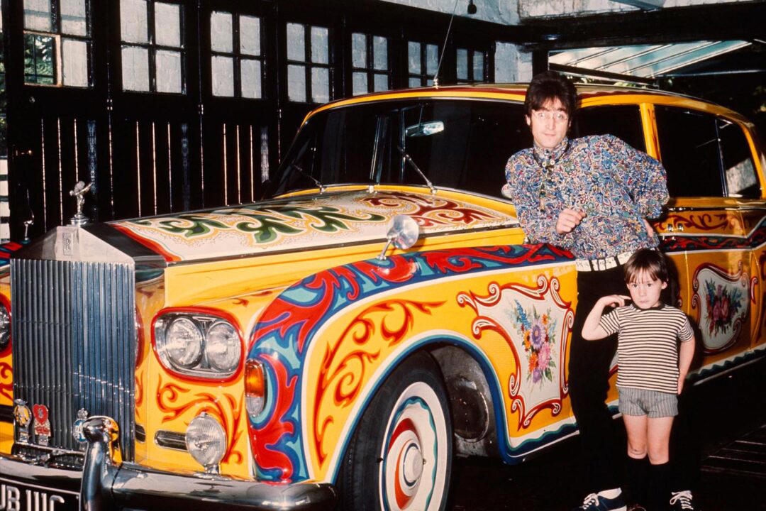 33. John Lennon Poses Next to a Psychedelic Rolls-Royce With Son Julian 1. Smile! Picture Day for a 2nd Grade Class, 2. ‘Christmas Day at Our Grandparent’s House in Jamaica, Queens’, 3. A Vietnam War Veteran Throws His Medal at the Capitol in Protest, Washington, D.C., April 23, 1971, 4. ‘My Mom in 1971’, 5. Wood Paneling and Shag Carpeting: Peak ’70s Vibes, 6. Colorized Image of Muhammad Ali Dodging a Punch From Joe Frazier in What Became Known as the ‘Fight of the Century’, 7. ‘Christmas, 1971. The Entire Family at My Grandparent’s House’, 8. Anti-Vietnam Protesters March Against War and Better Working Conditions in New York City, 9. Gene Wilder Shares a Laugh With Then-Child Actor Peter Ostrum, 10. ‘My Dad (Front) in Vietnam, 1971’, 11. Talk About a Boss Baby: ‘My Grandma and Uncle in Iran, April 1971’, 12. A Busy Street Scene in Midtown, Manhattan, 13. ‘Saturday Morning TV Lineup, Fall 1971’, 14. Because Who Needs Seatbelts?, 15. A Kid Shows Off His Brand New Christmas Gift, 16. ‘My Dad and Mom on Their Wedding Day, USSR, Ukraine’, 17. Richard Burton and Elizabeth Taylor at Heathrow Airport in London, 18. ‘My Dad and His Band, 1971’, 19. Just Some Siblings Being Silly on Easter Morning in New Jersey, 20. Actor Anthony Quinn on The Dick Cavett Show, 21. Christine ‘Chris’ Evert at the 1971 US Open, 22. ‘My Mom Being Crowned Homecoming Queen in 1971, Alabama’, 23. Actor Paul Newman Pictured at a Derby, September 1971, 24. ‘Bicycle Winner in a Shoe Store, 1971’, 25. Three Generations of Pearly White Smiles, 26. Crowds Gather Outside the Fillmore East in New York City, 27. ‘Cher at the Playboy Club, 1971’, 28. A Lively High School Parking Lot, 29. A Young Steve Martin Looking Effortlessly Cool, 30. ‘Ozzy Osbourne and His First Wife Thelma in 1971’, 31. Think There’s Enough Milk Stocked at the Grocery Store?, 32. Led Zeppelin Staying True to the Big Hair Trend of the ’70s, 33. John Lennon Poses Next to a Psychedelic Rolls-Royce With Son Julian, 34. A Very Colorful Shelley Duvall in Vogue