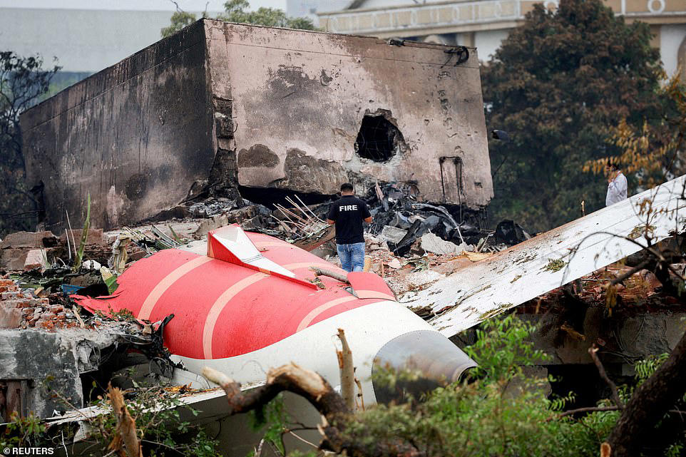 Plane crashes onto busy motorway exploding into a fireball