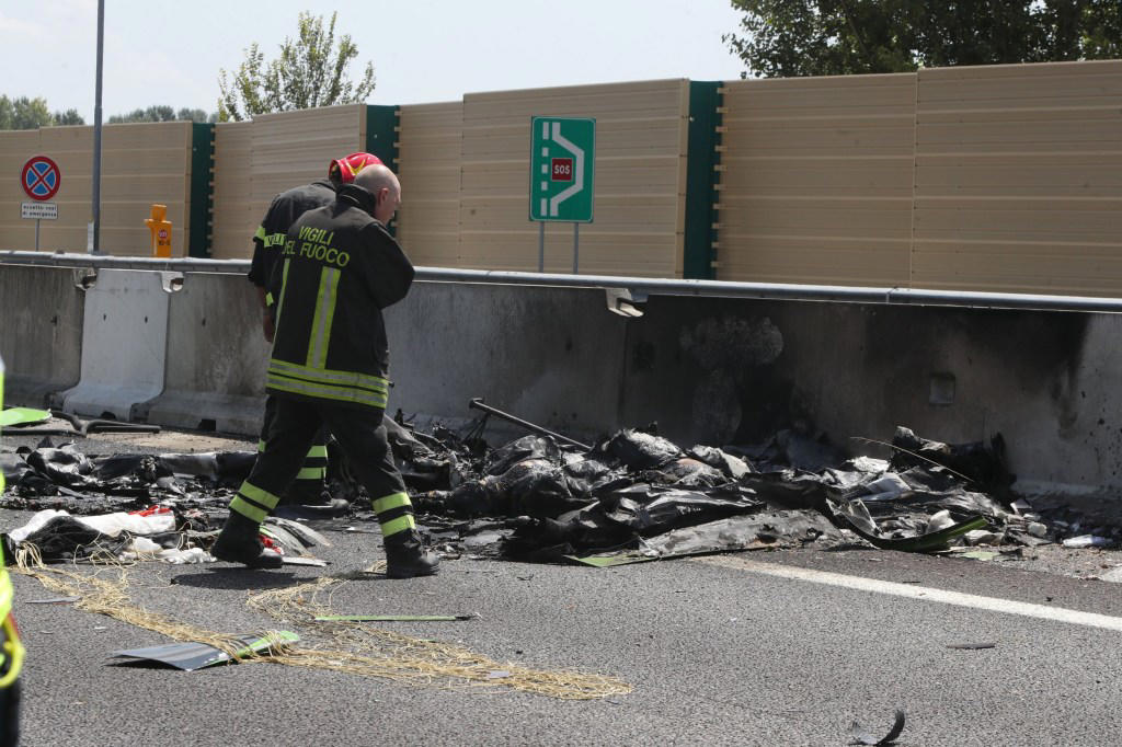 Plane nosedives into busy Italian highway killing two in huge fireball