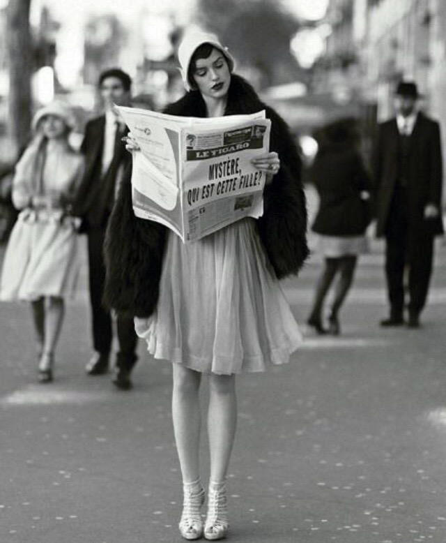 1. A Woman Strolls Through Paris While Reading the Paper 1. A Woman Strolls Through Paris While Reading the Paper, 2. Two Kids Play With a Toy Car on a Cobblestone Street With the Moulin Rouge in the Distance, 3. ‘A Pair of Lovers in Paris, France’, 4. Visitors Stroll Beneath the Eiffel Tower During the 1925 Exposition Internationale des Arts Décoratifs, 5. Colorized Image of Parisians Browsing Flowers Near the Tour de l’Horloge on the Île de la Cité, One of the City’s Oldest Clocks, 6. ‘Soldiers at the Metro Station Auteuil on the Boulevard Excelmans in Paris, France, on May 1, 1920’, 7. Colorized Image of a Hot Air Balloon Pre-Take Off, May 1923, 8. Two Women Enjoy a Coffee on a Terrace, 1925, 9. ‘A Street Scene in Paris During the 1924 Olympics’, 10. A Woman Enjoys a Meal Aboard a Zeppelin Heading to Berlin, 1928, 11. A Couple Dances Along the Seine as People Look on, 12. Singer and Dancer Josephine Baker Pictured at a Cabaret, 1927, 13. Three Children Pause for a Snack With the Sacré-Coeur in the Distance, 14. ‘Ernest Hemingway in Paris, 1920s’, 15. ‘Citroen Automobile Designed by Sonia Delaunay in Paris, 1925’, 16. A Young Gloria Vanderbilt and Her Pet Dog Playing in Front of the Eiffel Tower, 1921, 17. ‘Backstage at the Moulin Rouge, Paris, 1924’, 18. ‘Early Color Photography in Paris, France, 1920’, 19. Josephine Baker Taking Her Pet Cheetah for a Walk in Paris, 1923