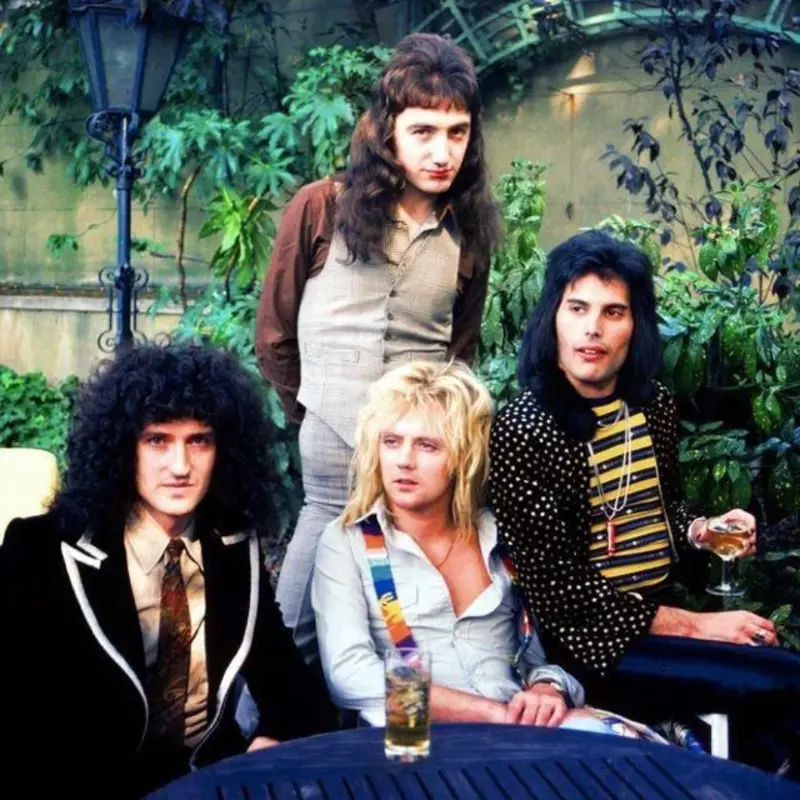1. Queen Was on Fire in 1976, Even if the Hairstyles Were Questionable 1. Queen Was on Fire in 1976, Even if the Hairstyles Were Questionable, 2. The Hudson River Lit Up with Boats and Patriotism on the 4th of July, 1976, 3. Barefoot and Beaming, Locals Paraded with Pride Through Pickering Beach in 1976, 4. A Helpful Hand at Kmart's Camera Counter as Film Photography Ruled 1976, 5. A Snapshot of LA Youth in the Summer of '76, 6. Festive Fries and Holiday Cheer at McDonald's in the Heart of the Seventies, 7. Marching to the Beat of Freedom During the 1976 Bicentennial Celebration, 8. A Fall Night on Broadway and 44th in 1976 Manhattan, 9. Candlelit Conversations and Cozy Vibes at a 1976 House Party, 10. This Toddler Had Style to Spare in 1976, 11. Lazy Beach Days and Summer Love in South Shields, 1976, 12. Packed Nights and Rock 'n' Roll Vibes Inside Max's Kansas City, NYC, 1976, 13. Americans Gather Around the Bicentennial "Freedom Train" Carrying Priceless Pieces of History, 14. Teenage Love Caught on Camera in a Quiet New York Room, 1976, 15. Chaos and Cheers at the Battle Royal in L.A.'s Olympic Auditorium, 16. Jodie Foster Stuns at Just 14 in the Gritty Classic Taxi Driver, 1976, 17. The Power of Christ Compels You at Detroit’s Infamous Exorcist Lounge, 1976, 18. Arcade Dreams and Mall Magic Collide at Old Chicago in 1976, 19. School Vaccinations in 1976 Highland Park, 20. Dancing in the Streets of Brooklyn During A Joyful Block Party Moment in 1976, 21. Serving Up Street Flavor Outside the Met on a Summer Day in 1976, 22. A Group of Kids Waits Patiently for the Subway in a Gritty 1976 New York City, 23. Neighborhood Kids Gear Up for Halloween With Their Spookiest Masks in 1976, 24. President Jimmy Carter Casually Hops a Fence at LaGuardia Airport With an Aide, 1976, 25. Dining Above the Clouds at Windows on the World, 1976, 26. David Bowie in 1976, Redefining Cool with Every Glance, 27. AC/DC Rocking Their Way to Global Fame in 1976, 28. A Young Woman Hitchhiking Through Florida's Sun-Soaked Highways in 1976, 29. A Group of Young Concertgoers Soaking Up the Vibes in Ohio, 30. A Surprising Snapshot of Hollywood Charm, 31. When Superheroes Took the Plunge at SeaWorld's Wild 1976 Show, 32. Charlie's Angels Redefined Cool and Confidence in 1976, 33. Kiss Turns Heads While Strutting Through NYC in Full Costume, 1976