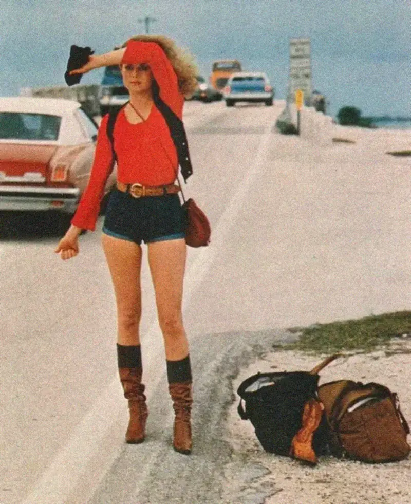 29. A Young Woman Hitchhiking Through Florida's Sun-Soaked Highways in 1976 1. Queen Was on Fire in 1976, Even if the Hairstyles Were Questionable, 2. The Hudson River Lit Up with Boats and Patriotism on the 4th of July, 1976, 3. Barefoot and Beaming, Locals Paraded with Pride Through Pickering Beach in 1976, 4. A Helpful Hand at Kmart's Camera Counter as Film Photography Ruled 1976, 5. A Snapshot of LA Youth in the Summer of '76, 6. Festive Fries and Holiday Cheer at McDonald's in the Heart of the Seventies, 7. Marching to the Beat of Freedom During the 1976 Bicentennial Celebration, 8. A Fall Night on Broadway and 44th in 1976 Manhattan, 9. Candlelit Conversations and Cozy Vibes at a 1976 House Party, 10. This Toddler Had Style to Spare in 1976, 11. Lazy Beach Days and Summer Love in South Shields, 1976, 12. Packed Nights and Rock 'n' Roll Vibes Inside Max's Kansas City, NYC, 1976, 13. Americans Gather Around the Bicentennial "Freedom Train" Carrying Priceless Pieces of History, 14. Teenage Love Caught on Camera in a Quiet New York Room, 1976, 15. Chaos and Cheers at the Battle Royal in L.A.'s Olympic Auditorium, 16. Jodie Foster Stuns at Just 14 in the Gritty Classic Taxi Driver, 1976, 17. The Power of Christ Compels You at Detroit’s Infamous Exorcist Lounge, 1976, 18. Arcade Dreams and Mall Magic Collide at Old Chicago in 1976, 19. School Vaccinations in 1976 Highland Park, 20. Dancing in the Streets of Brooklyn During A Joyful Block Party Moment in 1976, 21. Serving Up Street Flavor Outside the Met on a Summer Day in 1976, 22. A Group of Kids Waits Patiently for the Subway in a Gritty 1976 New York City, 23. Neighborhood Kids Gear Up for Halloween With Their Spookiest Masks in 1976, 24. President Jimmy Carter Casually Hops a Fence at LaGuardia Airport With an Aide, 1976, 25. Dining Above the Clouds at Windows on the World, 1976, 26. David Bowie in 1976, Redefining Cool with Every Glance, 27. AC/DC Rocking Their Way to Global Fame in 1976, 28. A Young Woman Hitchhiking Through Florida's Sun-Soaked Highways in 1976, 29. A Group of Young Concertgoers Soaking Up the Vibes in Ohio, 30. A Surprising Snapshot of Hollywood Charm, 31. When Superheroes Took the Plunge at SeaWorld's Wild 1976 Show, 32. Charlie's Angels Redefined Cool and Confidence in 1976, 33. Kiss Turns Heads While Strutting Through NYC in Full Costume, 1976