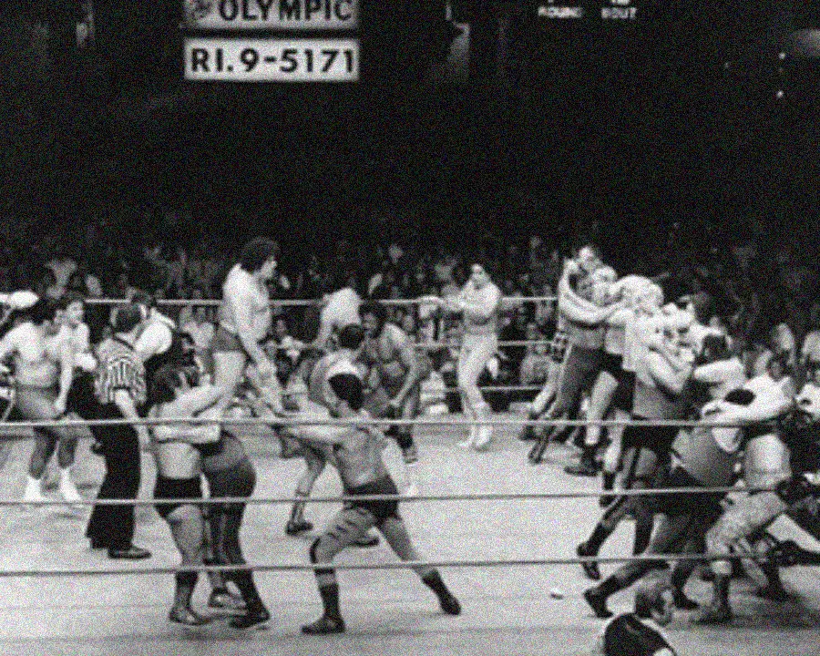 16. Chaos and Cheers at the Battle Royal in L.A.'s Olympic Auditorium 1. Queen Was on Fire in 1976, Even if the Hairstyles Were Questionable, 2. The Hudson River Lit Up with Boats and Patriotism on the 4th of July, 1976, 3. Barefoot and Beaming, Locals Paraded with Pride Through Pickering Beach in 1976, 4. A Helpful Hand at Kmart's Camera Counter as Film Photography Ruled 1976, 5. A Snapshot of LA Youth in the Summer of '76, 6. Festive Fries and Holiday Cheer at McDonald's in the Heart of the Seventies, 7. Marching to the Beat of Freedom During the 1976 Bicentennial Celebration, 8. A Fall Night on Broadway and 44th in 1976 Manhattan, 9. Candlelit Conversations and Cozy Vibes at a 1976 House Party, 10. This Toddler Had Style to Spare in 1976, 11. Lazy Beach Days and Summer Love in South Shields, 1976, 12. Packed Nights and Rock 'n' Roll Vibes Inside Max's Kansas City, NYC, 1976, 13. Americans Gather Around the Bicentennial "Freedom Train" Carrying Priceless Pieces of History, 14. Teenage Love Caught on Camera in a Quiet New York Room, 1976, 15. Chaos and Cheers at the Battle Royal in L.A.'s Olympic Auditorium, 16. Jodie Foster Stuns at Just 14 in the Gritty Classic Taxi Driver, 1976, 17. The Power of Christ Compels You at Detroit’s Infamous Exorcist Lounge, 1976, 18. Arcade Dreams and Mall Magic Collide at Old Chicago in 1976, 19. School Vaccinations in 1976 Highland Park, 20. Dancing in the Streets of Brooklyn During A Joyful Block Party Moment in 1976, 21. Serving Up Street Flavor Outside the Met on a Summer Day in 1976, 22. A Group of Kids Waits Patiently for the Subway in a Gritty 1976 New York City, 23. Neighborhood Kids Gear Up for Halloween With Their Spookiest Masks in 1976, 24. President Jimmy Carter Casually Hops a Fence at LaGuardia Airport With an Aide, 1976, 25. Dining Above the Clouds at Windows on the World, 1976, 26. David Bowie in 1976, Redefining Cool with Every Glance, 27. AC/DC Rocking Their Way to Global Fame in 1976, 28. A Young Woman Hitchhiking Through Florida's Sun-Soaked Highways in 1976, 29. A Group of Young Concertgoers Soaking Up the Vibes in Ohio, 30. A Surprising Snapshot of Hollywood Charm, 31. When Superheroes Took the Plunge at SeaWorld's Wild 1976 Show, 32. Charlie's Angels Redefined Cool and Confidence in 1976, 33. Kiss Turns Heads While Strutting Through NYC in Full Costume, 1976