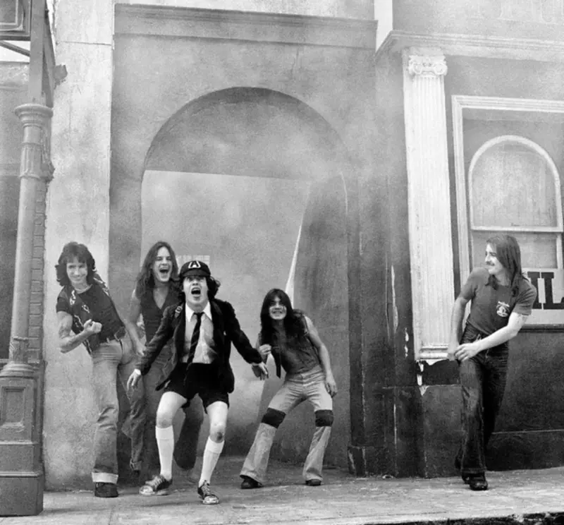 28. AC/DC Rocking Their Way to Global Fame in 1976 1. Queen Was on Fire in 1976, Even if the Hairstyles Were Questionable, 2. The Hudson River Lit Up with Boats and Patriotism on the 4th of July, 1976, 3. Barefoot and Beaming, Locals Paraded with Pride Through Pickering Beach in 1976, 4. A Helpful Hand at Kmart's Camera Counter as Film Photography Ruled 1976, 5. A Snapshot of LA Youth in the Summer of '76, 6. Festive Fries and Holiday Cheer at McDonald's in the Heart of the Seventies, 7. Marching to the Beat of Freedom During the 1976 Bicentennial Celebration, 8. A Fall Night on Broadway and 44th in 1976 Manhattan, 9. Candlelit Conversations and Cozy Vibes at a 1976 House Party, 10. This Toddler Had Style to Spare in 1976, 11. Lazy Beach Days and Summer Love in South Shields, 1976, 12. Packed Nights and Rock 'n' Roll Vibes Inside Max's Kansas City, NYC, 1976, 13. Americans Gather Around the Bicentennial "Freedom Train" Carrying Priceless Pieces of History, 14. Teenage Love Caught on Camera in a Quiet New York Room, 1976, 15. Chaos and Cheers at the Battle Royal in L.A.'s Olympic Auditorium, 16. Jodie Foster Stuns at Just 14 in the Gritty Classic Taxi Driver, 1976, 17. The Power of Christ Compels You at Detroit’s Infamous Exorcist Lounge, 1976, 18. Arcade Dreams and Mall Magic Collide at Old Chicago in 1976, 19. School Vaccinations in 1976 Highland Park, 20. Dancing in the Streets of Brooklyn During A Joyful Block Party Moment in 1976, 21. Serving Up Street Flavor Outside the Met on a Summer Day in 1976, 22. A Group of Kids Waits Patiently for the Subway in a Gritty 1976 New York City, 23. Neighborhood Kids Gear Up for Halloween With Their Spookiest Masks in 1976, 24. President Jimmy Carter Casually Hops a Fence at LaGuardia Airport With an Aide, 1976, 25. Dining Above the Clouds at Windows on the World, 1976, 26. David Bowie in 1976, Redefining Cool with Every Glance, 27. AC/DC Rocking Their Way to Global Fame in 1976, 28. A Young Woman Hitchhiking Through Florida's Sun-Soaked Highways in 1976, 29. A Group of Young Concertgoers Soaking Up the Vibes in Ohio, 30. A Surprising Snapshot of Hollywood Charm, 31. When Superheroes Took the Plunge at SeaWorld's Wild 1976 Show, 32. Charlie's Angels Redefined Cool and Confidence in 1976, 33. Kiss Turns Heads While Strutting Through NYC in Full Costume, 1976