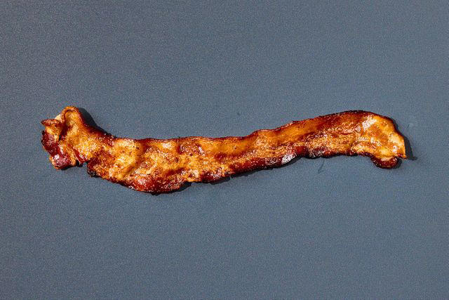 A word about our method, A quick spin in the microwave, A long sous vide soak, Starting in a hot skillet, Grilling in a pan, Air-frying , Starting in a cold skillet, Winner: Baking bacon in the oven , Final Takeaways