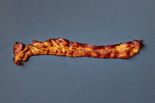 A word about our method, A quick spin in the microwave, A long sous vide soak, Starting in a hot skillet, Grilling in a pan, Air-frying , Starting in a cold skillet, Winner: Baking bacon in the oven , Final Takeaways