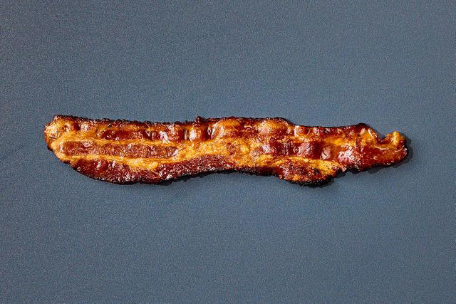 A word about our method, A quick spin in the microwave, A long sous vide soak, Starting in a hot skillet, Grilling in a pan, Air-frying , Starting in a cold skillet, Winner: Baking bacon in the oven , Final Takeaways