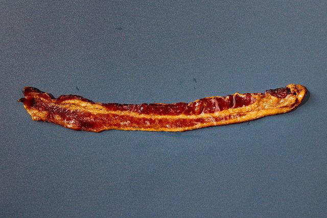 A word about our method, A quick spin in the microwave, A long sous vide soak, Starting in a hot skillet, Grilling in a pan, Air-frying , Starting in a cold skillet, Winner: Baking bacon in the oven , Final Takeaways