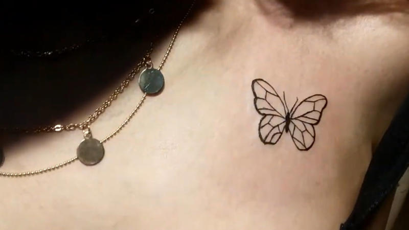 1. Dainty Butterfly On Collarbone, 2. Tiny Heart Outline On Wrist, 3. Mini Moon Behind The Ear, 4. Feather On Inner Forearm, 5. Tiny Rose On Finger, 6. Single Star On Ankle, 7. Mini Crown On Nape, 8. Cherry Blossom On Ribcage, 9. Tiny Paw Print On Foot, 10. Dandelion With Blowing Seeds, 11. Angel Wings On The Back Of The Arm, 12. Tiny Script Word On Collarbone, 13. Tiny Rainbow On Wrist, 14. Wine Glass On Hip, 15. Anchor On Side Rib, 16. Music Note Behind The Ear, 17. Lavender Sprig On Arm, 18. Infinity Symbol With Initials, 19. Tiny Mushroom Cluster On Ankle, 20. Cupcake With Cherry On Top On Hip