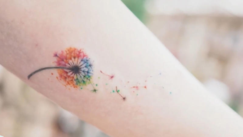 1. Dainty Butterfly On Collarbone, 2. Tiny Heart Outline On Wrist, 3. Mini Moon Behind The Ear, 4. Feather On Inner Forearm, 5. Tiny Rose On Finger, 6. Single Star On Ankle, 7. Mini Crown On Nape, 8. Cherry Blossom On Ribcage, 9. Tiny Paw Print On Foot, 10. Dandelion With Blowing Seeds, 11. Angel Wings On The Back Of The Arm, 12. Tiny Script Word On Collarbone, 13. Tiny Rainbow On Wrist, 14. Wine Glass On Hip, 15. Anchor On Side Rib, 16. Music Note Behind The Ear, 17. Lavender Sprig On Arm, 18. Infinity Symbol With Initials, 19. Tiny Mushroom Cluster On Ankle, 20. Cupcake With Cherry On Top On Hip