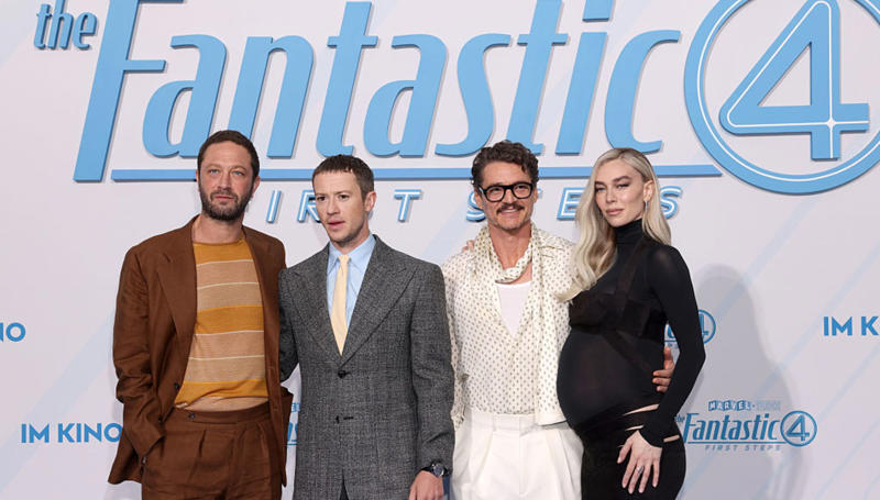 Pedro Pascal and his band on Fantastic Four's heroic blue carpet Pedro Pascal and his band on Fantastic Four's heroic blue carpet, Pedro Pascal, Vanessa Kirby, Joseph Quinn, Ebon Moss-Bachrach, Cosplayers of the Fantastic Four, SIlver Surfer and Dr. Doom, Jana Riva, Paula Gorczyca, Noah Miguell and Lara Spengler, Lucy Hellenbrecht, Alina Khan