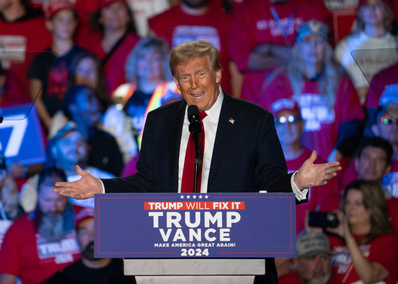 Trump speaks at Macomb Community College, Trump interviewed by Senator Marsha Blackburn, Trump and VP-elect Vance at inauguration, Trump signs documents after inauguration, Trump acceptance speech after election, Trump salutes troops at inauguration, Trump gestures during presidential inauguration