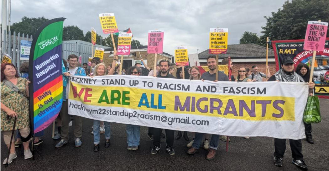 Pictured: Anti-migrant protesters gather outside Britannia Hotel in Canary Wharf, Pictured: Anti-migrant protesters gather outside Bell Hotel in Epping, Protesters and counter-demonstrators gather in Epping, Pictured: Stand Up To Racism crowd grows ahead of Epping protest, Canary Wharf locals protest use of Britannia hotel for migrants, Two men charged with public order offence after Diss hotel protest, Pictured: Police gather in Epping ahead of migrant hotel protests, Poll reveals British view on small boat crossings, Residents feel 'trapped' as harassment fears grow around migrant hotel protests, Nigel Farage apologises after false Epping protest claim, Elite police division monitoring social media to prevent Epping unrest, What caused the Epping anti-migration protests?, Essex police announces plan for Epping protests, Protests organised by members of Neo-Nazi groups, Police announce new protest restrictions to tackle unrest, Asylum seekers afraid to leave hotel amid protests