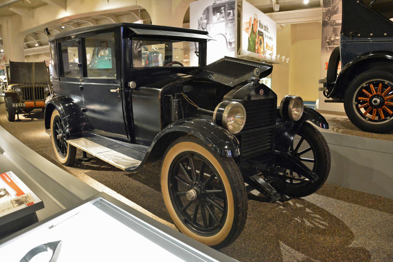 Essex Coach (1924) Roper steam carriage (1865), Ford 999 (1902), Holsman Runabout (1903), Scripps-Booth Rocket (1913), Detroit-Electric Model 47 (1914), Brewster Town Landaulet (1915), Chevrolet Royal Mail (1915), Woods Dual-Power (1916), Chrysler B-70 (1924), Essex Coach (1924), Ford Flivver (1926), Blue Bird school bus (1927), Lincoln Zephyr (1936), Lincoln Bubbletop (1950), Crosley Hotshot (1951), Chrysler 300-B (1956), Cornell-Liberty Safety Car (1957), Ford Mustang I concept (1962), Buick Riviera (1963), Chrysler turbine car (1963), Ford Mustang (1965), Toyota Corona (1966), Ford Mark IV (1967), Mercury Cougar (1968), Lincoln presidential limousine (1972), Chrysler Newport (1973), Dodge Omni (1978), Comuta-Car (1980), Ford Escort (1981), Plymouth Voyager (1984), Ford Taurus (1986), General Motors EV1 (1997), Toyota Prius (1997), Ford Focus Electric (2009)