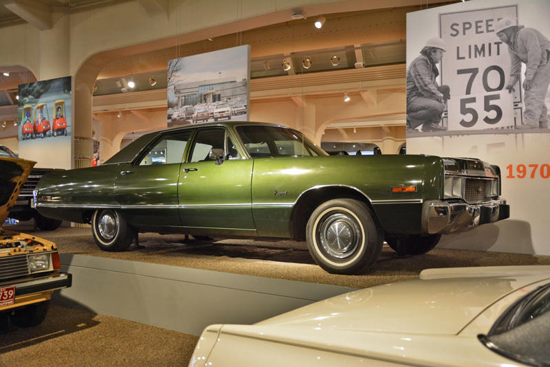 Chrysler Newport (1973) Roper steam carriage (1865), Ford 999 (1902), Holsman Runabout (1903), Scripps-Booth Rocket (1913), Detroit-Electric Model 47 (1914), Brewster Town Landaulet (1915), Chevrolet Royal Mail (1915), Woods Dual-Power (1916), Chrysler B-70 (1924), Essex Coach (1924), Ford Flivver (1926), Blue Bird school bus (1927), Lincoln Zephyr (1936), Lincoln Bubbletop (1950), Crosley Hotshot (1951), Chrysler 300-B (1956), Cornell-Liberty Safety Car (1957), Ford Mustang I concept (1962), Buick Riviera (1963), Chrysler turbine car (1963), Ford Mustang (1965), Toyota Corona (1966), Ford Mark IV (1967), Mercury Cougar (1968), Lincoln presidential limousine (1972), Chrysler Newport (1973), Dodge Omni (1978), Comuta-Car (1980), Ford Escort (1981), Plymouth Voyager (1984), Ford Taurus (1986), General Motors EV1 (1997), Toyota Prius (1997), Ford Focus Electric (2009)
