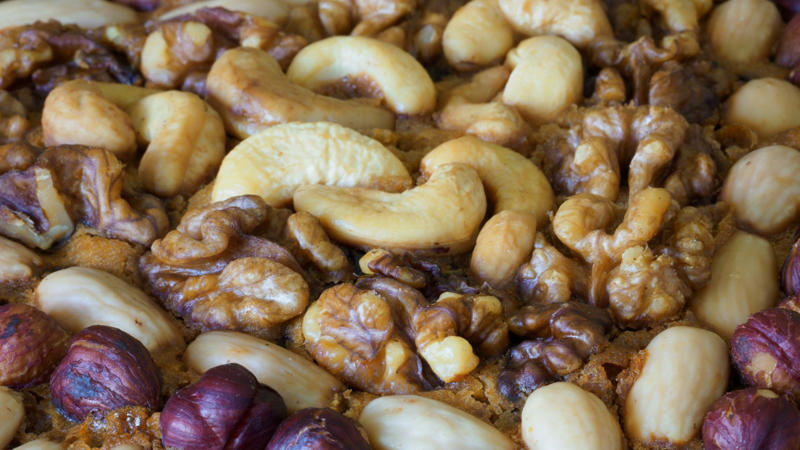 1. Toasted Bread, 2. Potato Chips, 3. Fried Chicken, 4. Granola Bars, 5. Tomato Sauce, 6. Raw Vegetables, 7. Crackers, 8. Peanut Butter, 9. Donuts, 10. Toasted Nuts, 1. Mashed Potatoes, 2. Cooked Carrots, 3. Scrambled Eggs, 4. Applesauce, 5. Oatmeal, 6. Steamed Zucchini, 7. Soft-Cooked Pumpkin, 8. Ripe Bananas, 9. Boiled Rice, 10. Avocado