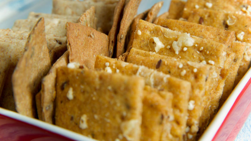 1. Toasted Bread, 2. Potato Chips, 3. Fried Chicken, 4. Granola Bars, 5. Tomato Sauce, 6. Raw Vegetables, 7. Crackers, 8. Peanut Butter, 9. Donuts, 10. Toasted Nuts, 1. Mashed Potatoes, 2. Cooked Carrots, 3. Scrambled Eggs, 4. Applesauce, 5. Oatmeal, 6. Steamed Zucchini, 7. Soft-Cooked Pumpkin, 8. Ripe Bananas, 9. Boiled Rice, 10. Avocado